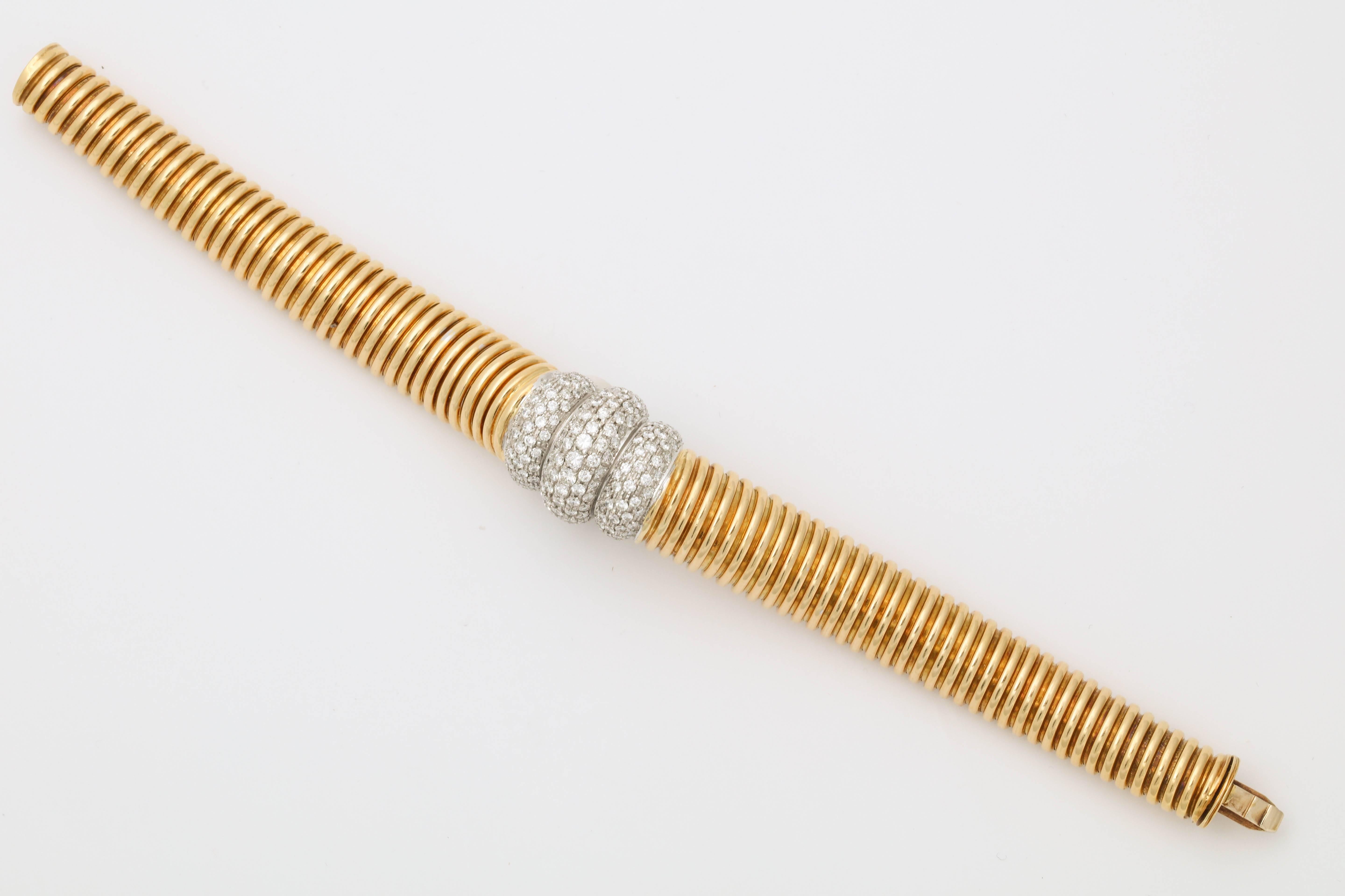 1980s Flexible Tubogas Snake Diamond and High Polish Ridged Gold Bracelet 2