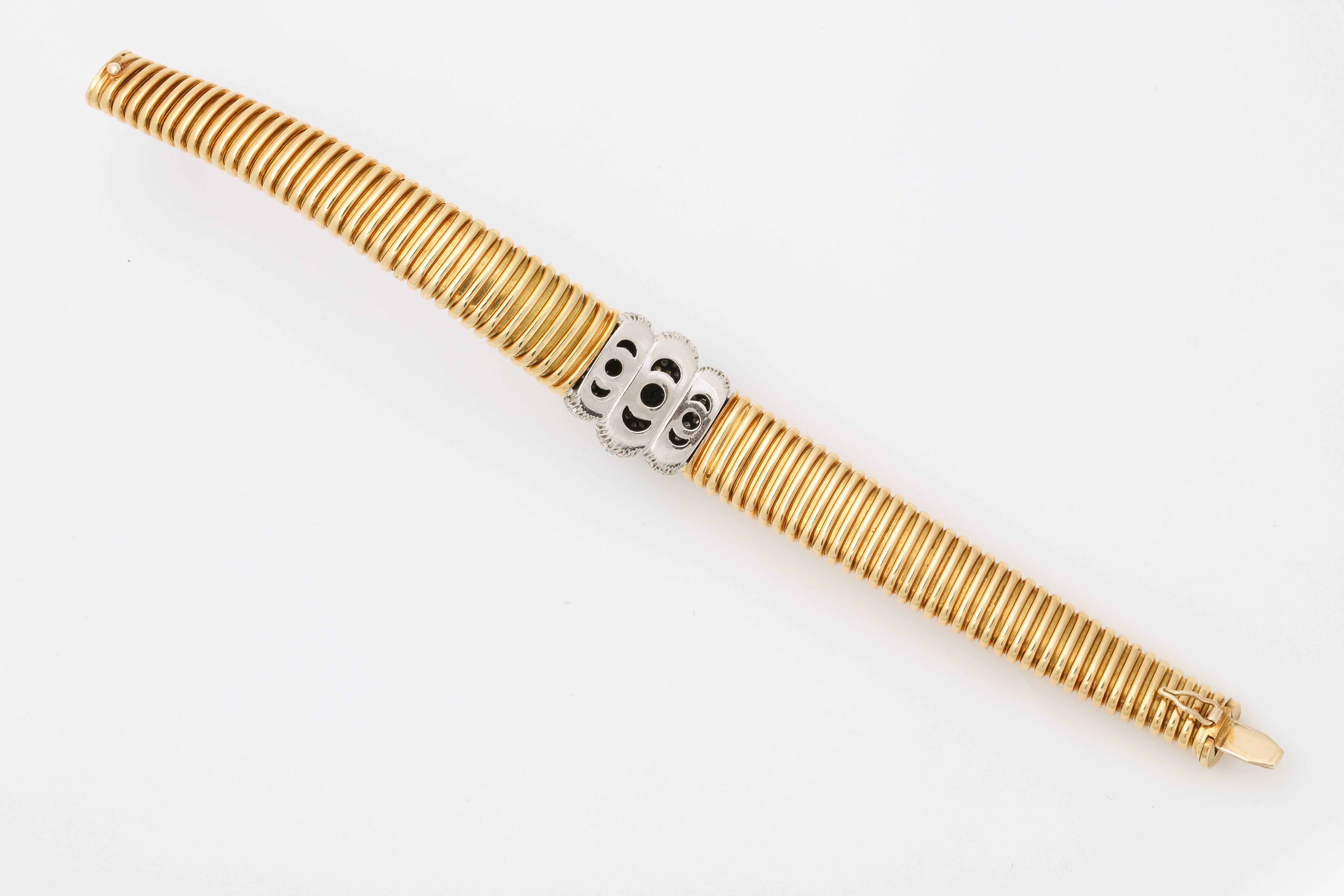 1980s Flexible Tubogas Snake Diamond and High Polish Ridged Gold Bracelet 3