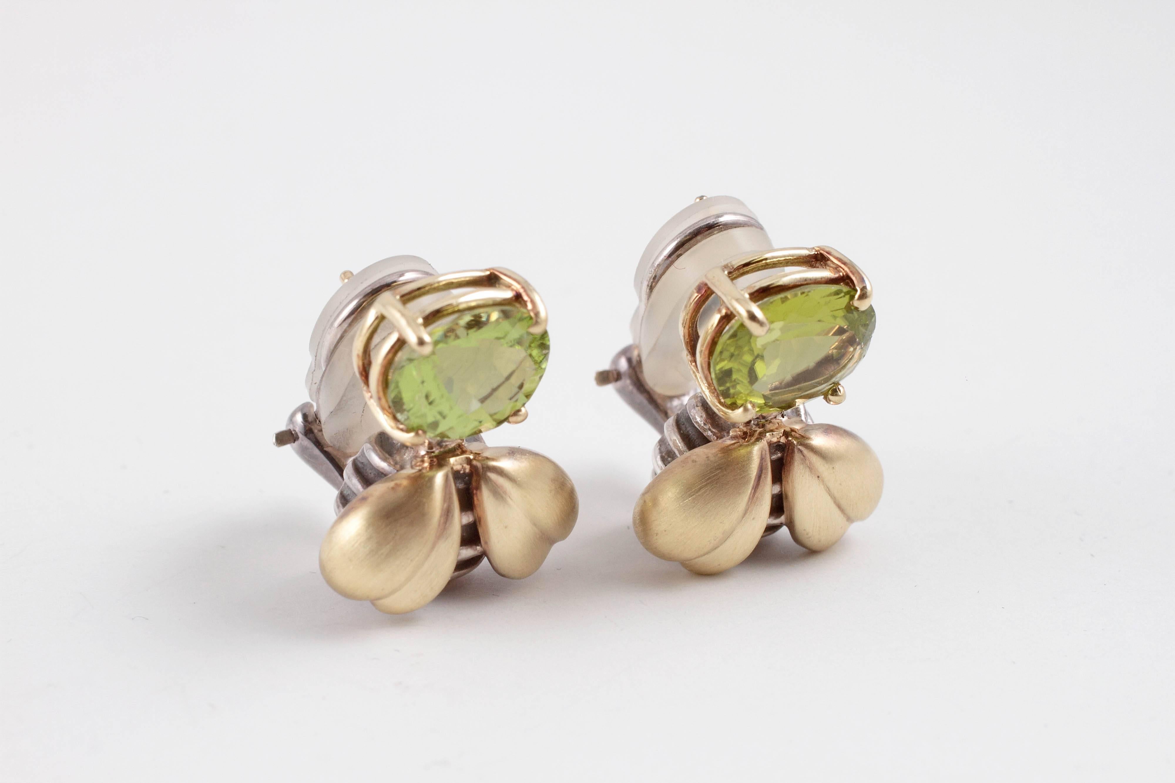How fun are these?  With pierced/clip backs and yellow gold bee forms, topped with a lovely oval-shaped peridot!