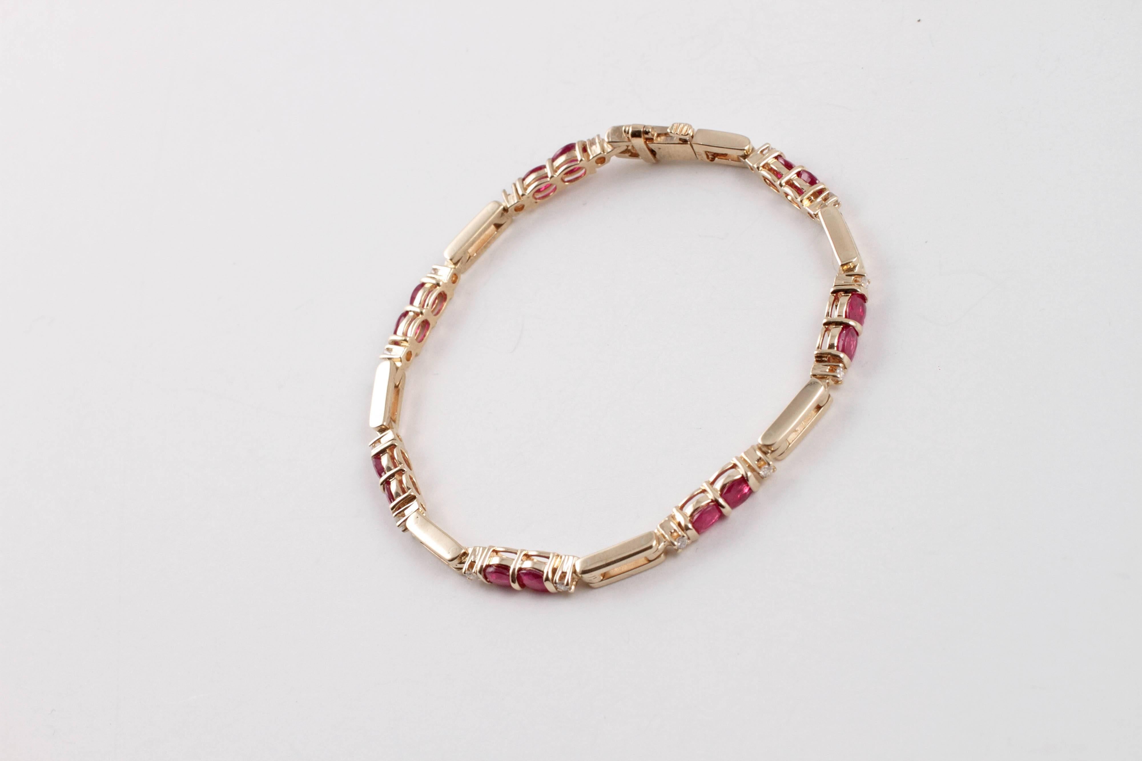 7 inch long alluring ruby and diamond bracelet perfect for that special someone!   This 14 karat yellow gold beauty will draw every eye in the room.