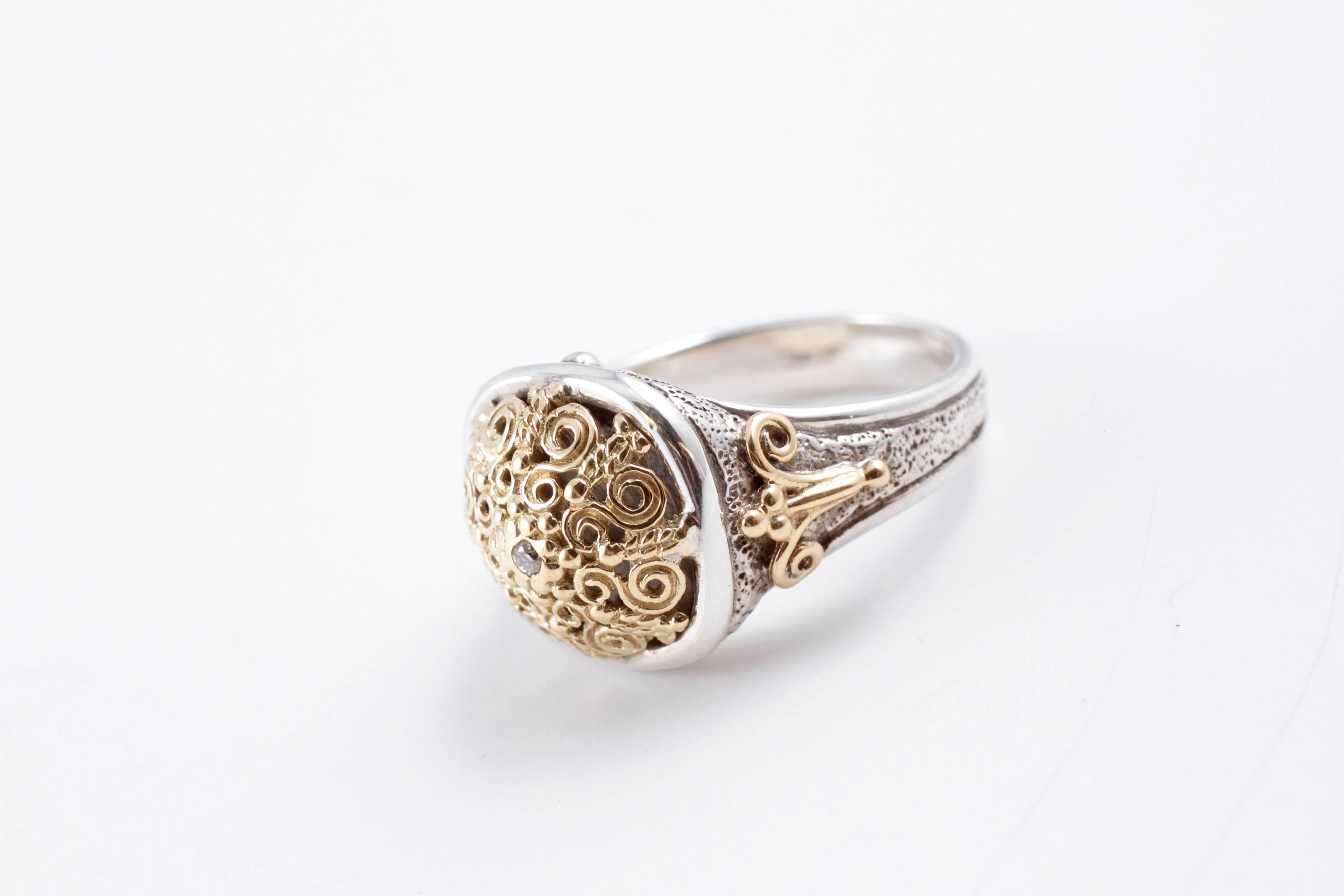 Beautifully detailed Konstantino ring in 18 karat yellow gold and sterling silver with diamond accent.  Great to wear everyday or for special occasions!