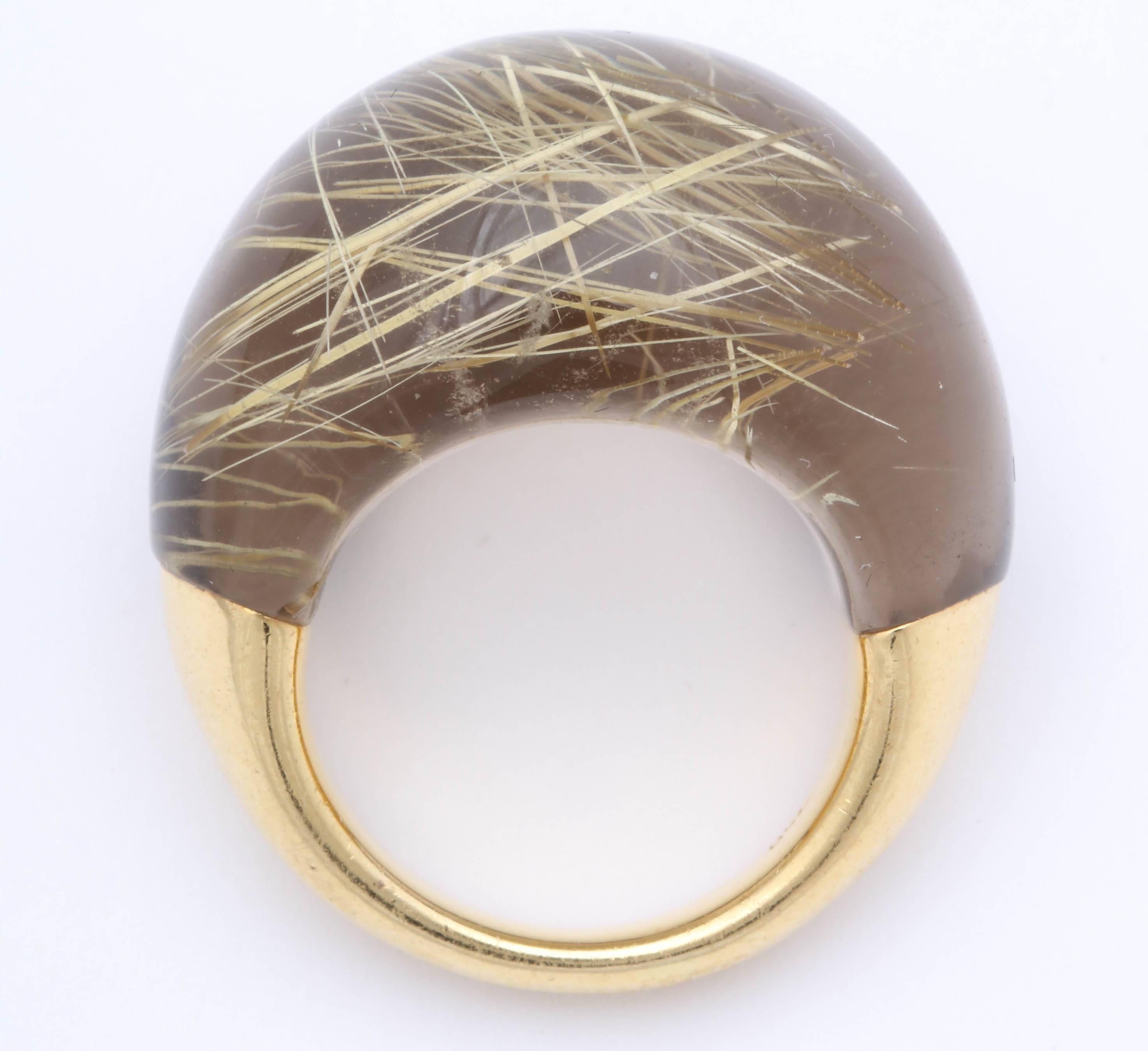 Modernist 18kt Yellow Gold Ring domed by a polished Rutilated Quartz Top   Very high style and chic.  Honey blond stone with evidence of quartz interior. Marked 750 for 18kt.