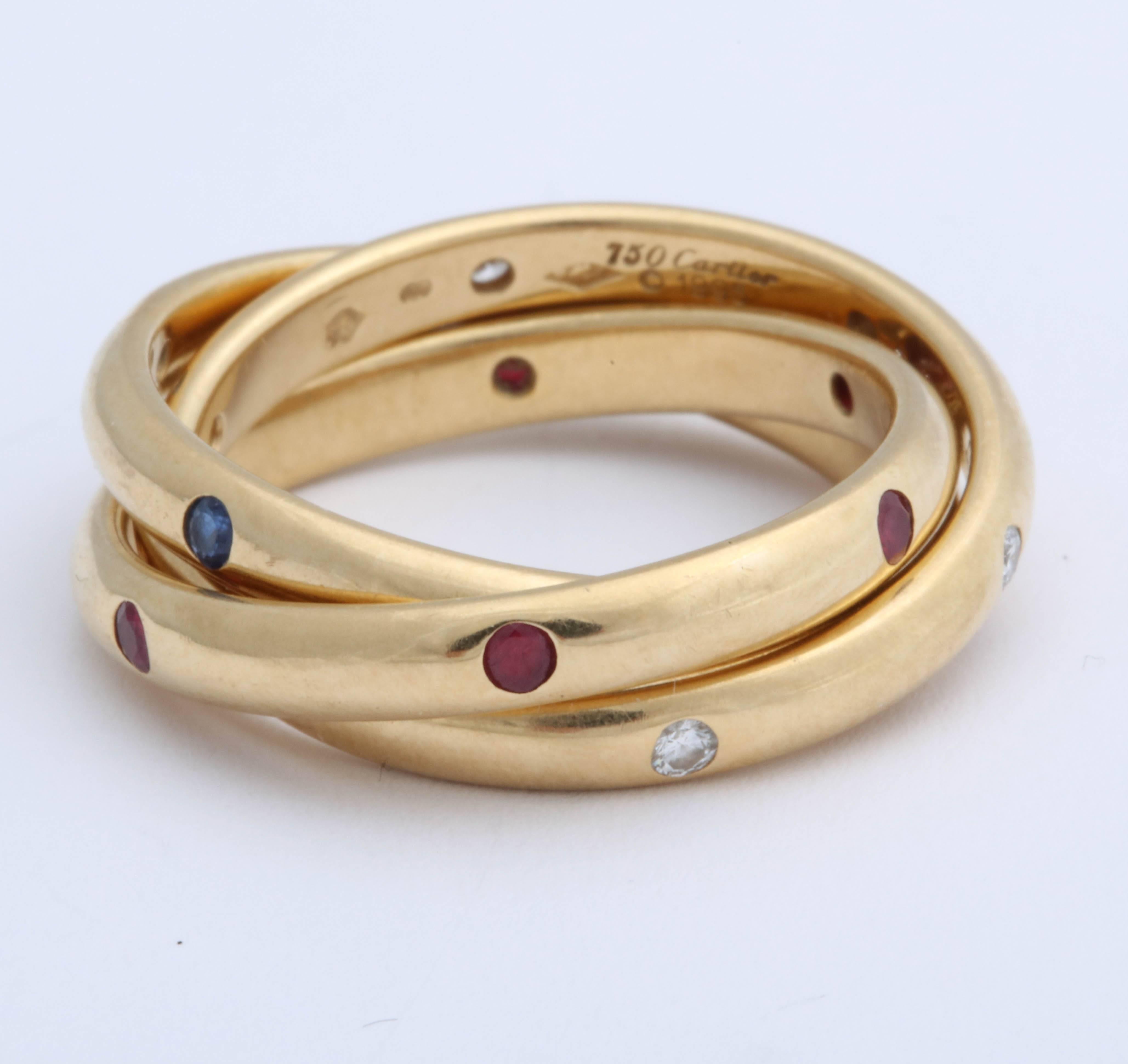Cartier 1995 - Paris - size 52 & numbered D79431 Trinity Ring - Each set with6 precious stones.  Chic beyond words