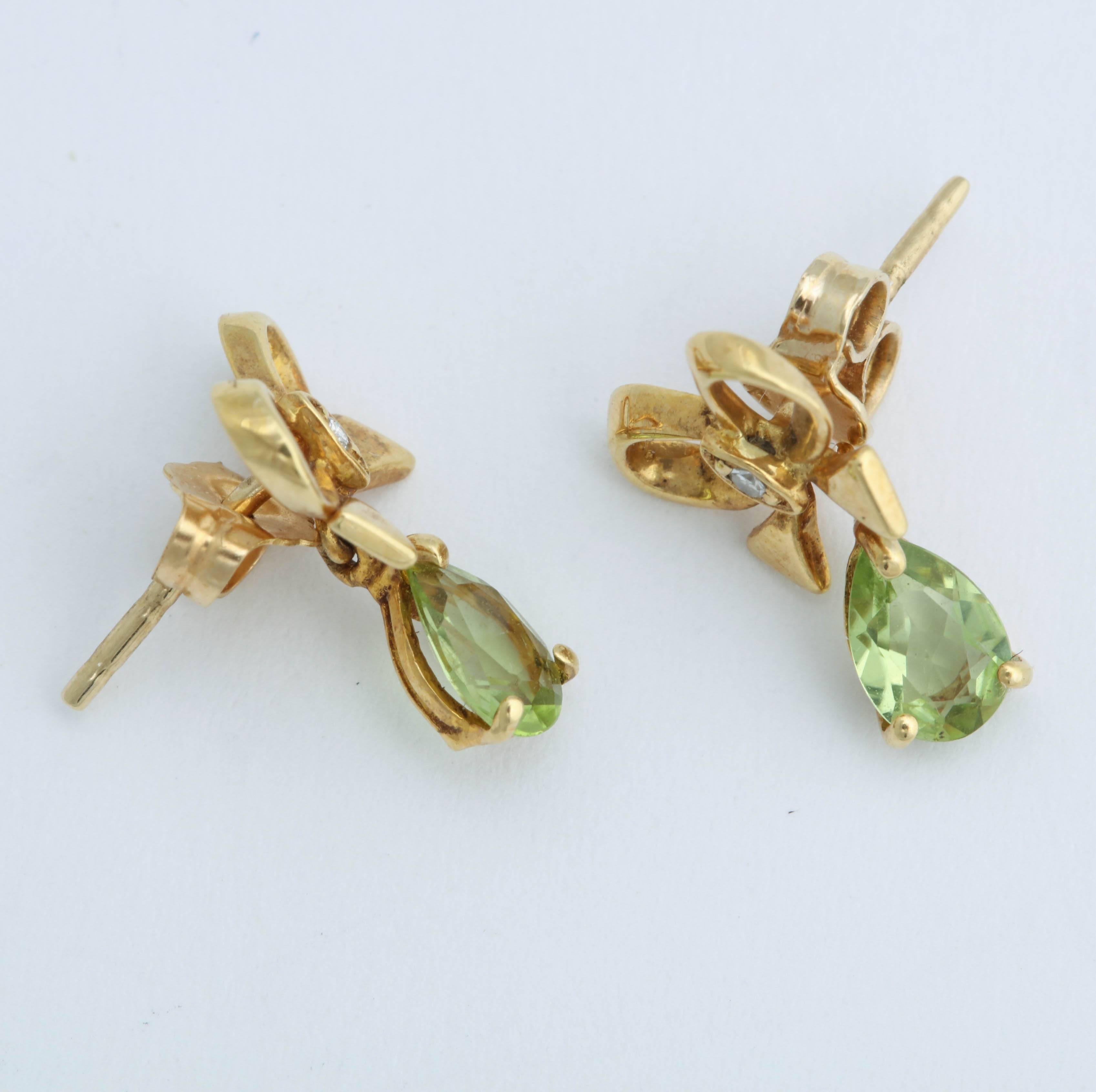 Pear Cut Bow Earrings with Pear Shaped Peridot For Sale
