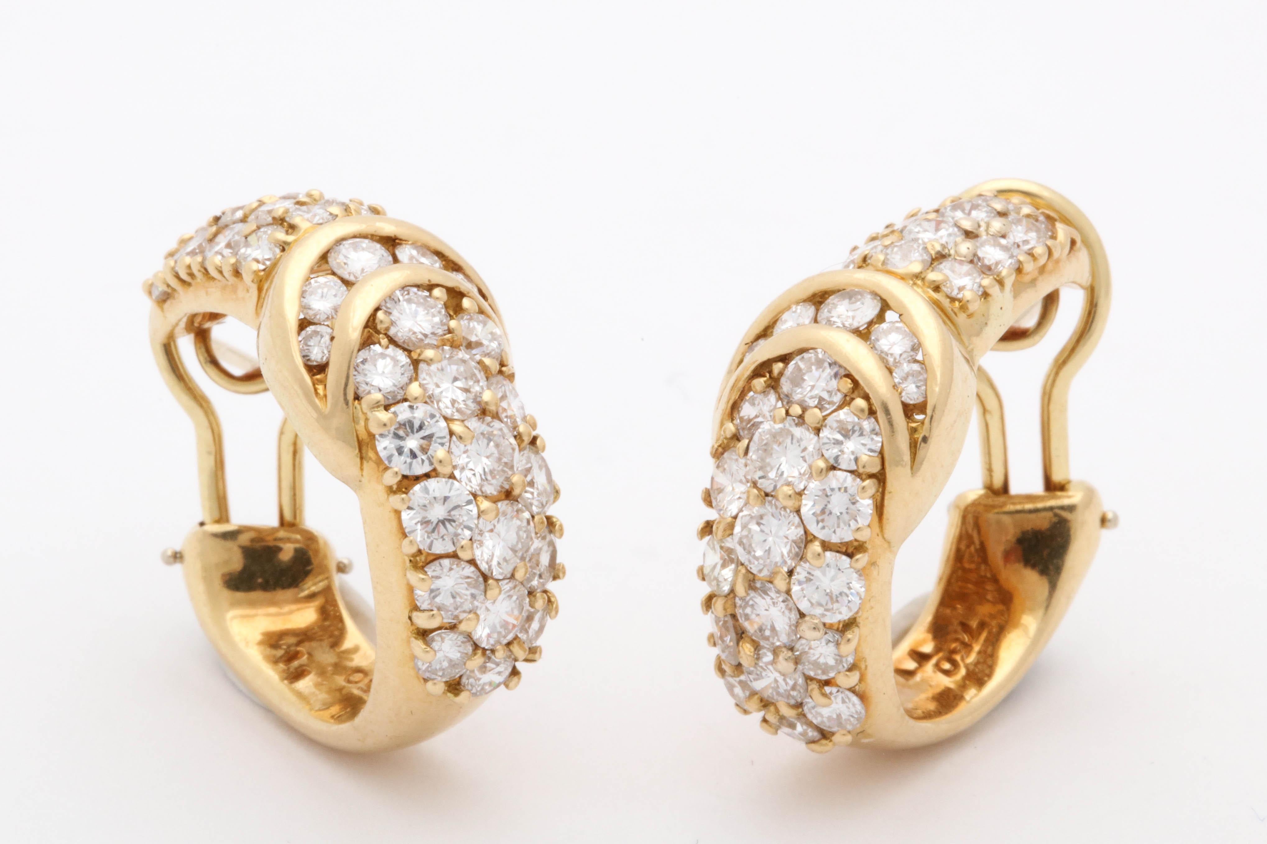 One Pair Of Ladies High Quality 18kt Yellow Gold Half Hoop Design Earclips With Posts. Earrings Are Embellished With Numerous Full Cut Diamonds Weighing Approximately 4.50 Cts Total Weight.Designed By Hammerman Brothers In The 1960's In The United