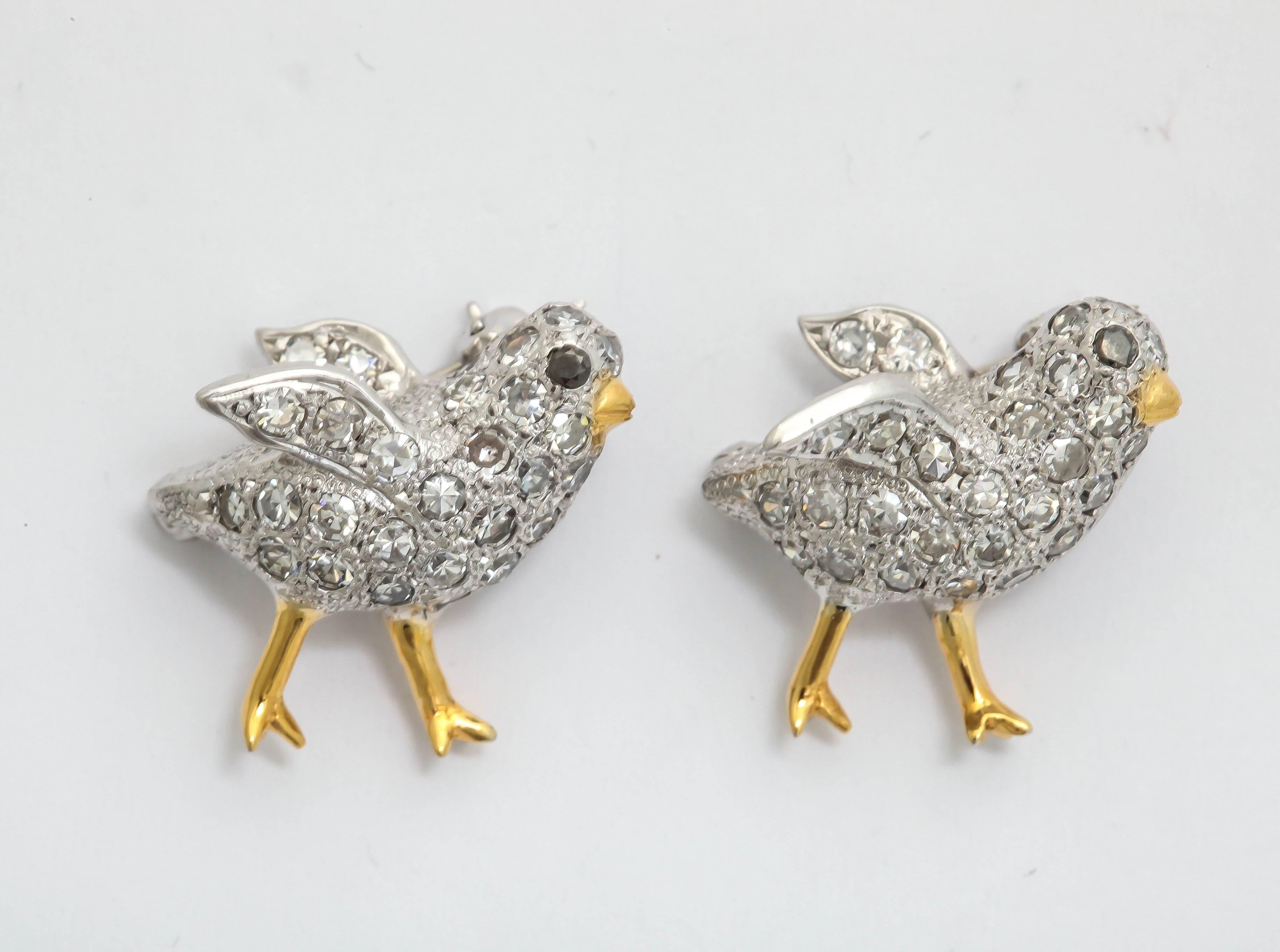 Adorable Chick-A-Dee Pair of brooches comprising of numerous old mine cut diamonds weighing approximately 2 carats Total Weight & Further Exhibiting Beautiful Handmade Textured Platinum Craftmanship With 18kt Yellow Gold Features For Beaks And Crows