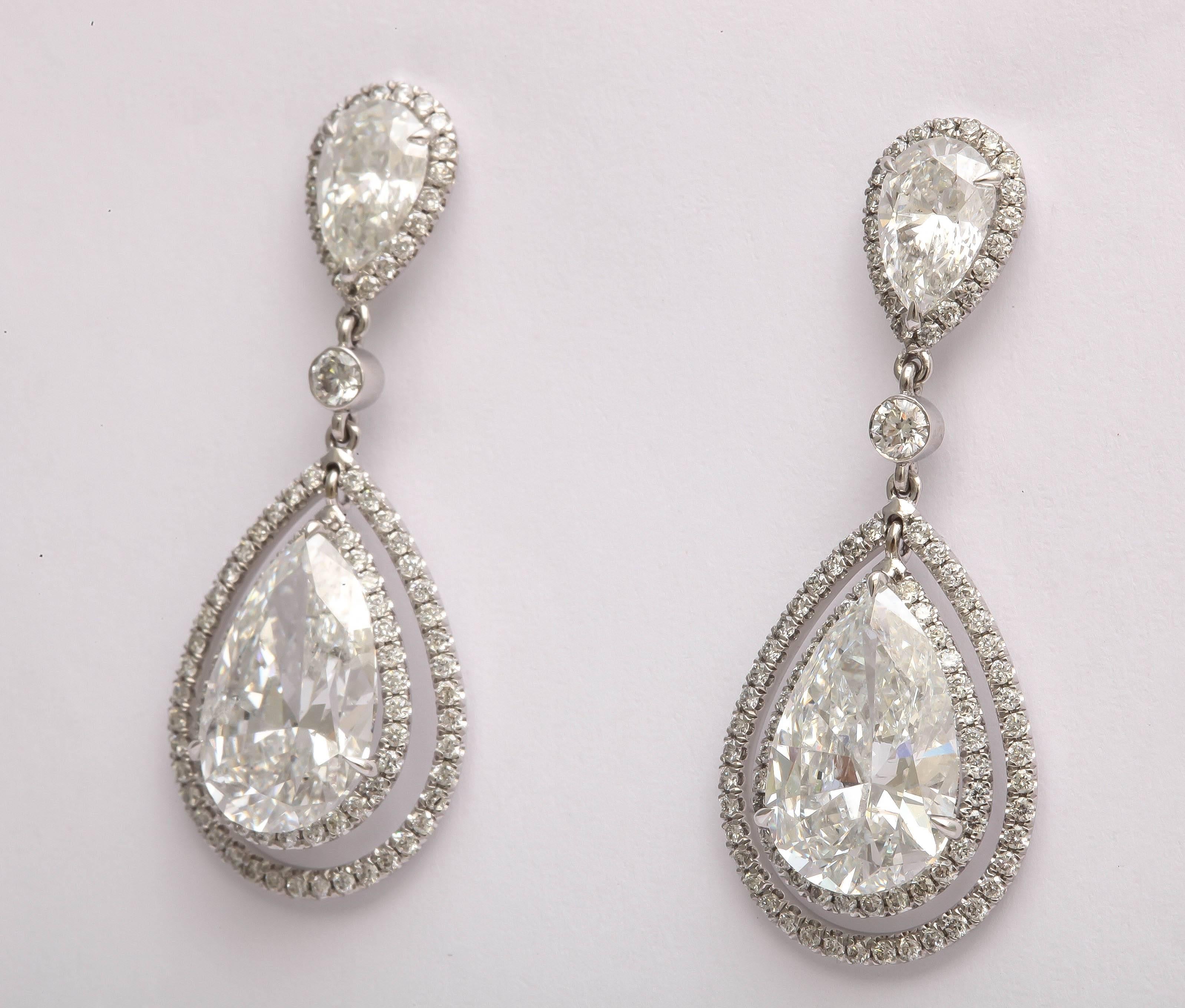 Women's Regal Large Pear Shaped Diamond Dangling Earrings For Sale