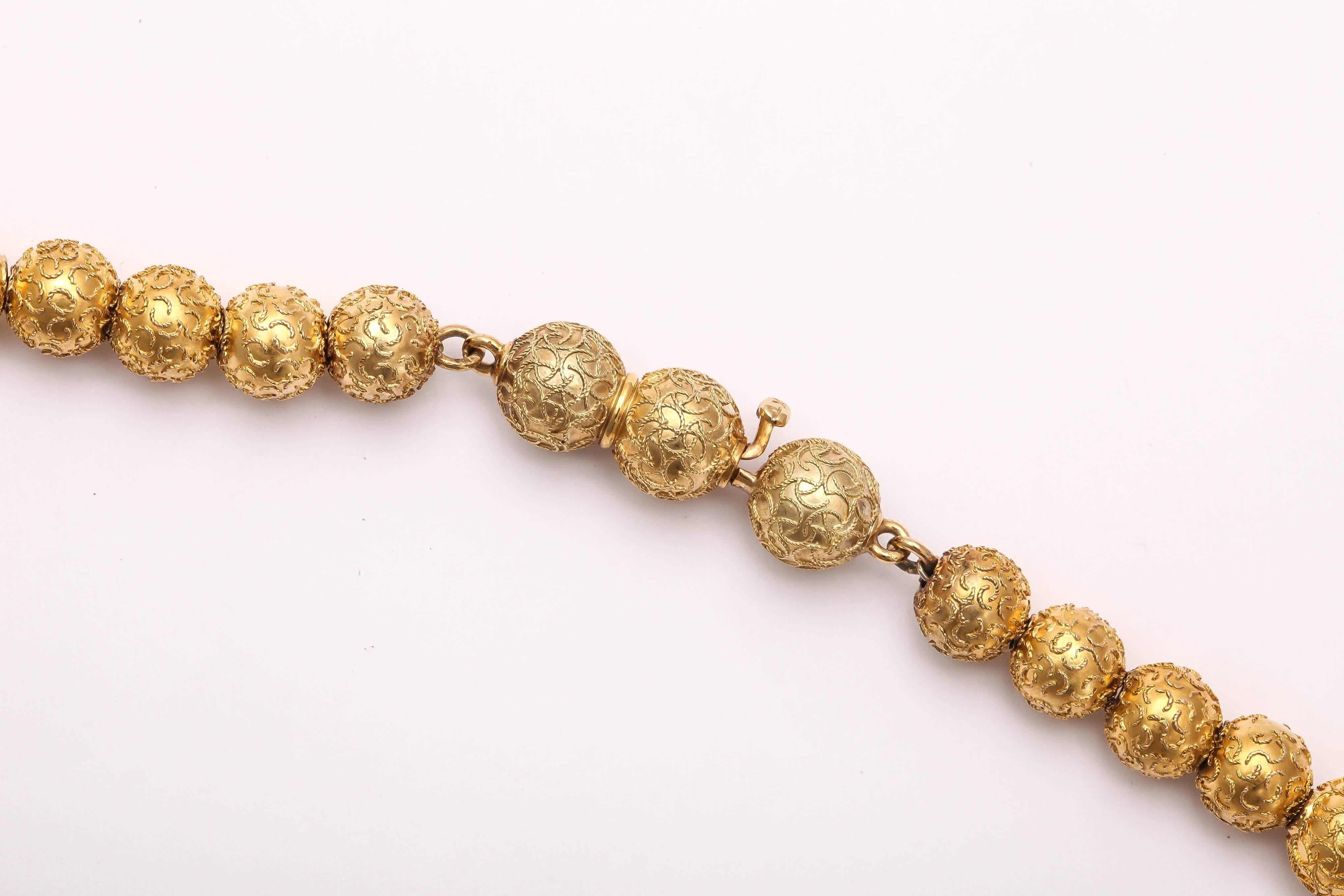 Intricately Engraved Gold Bead Necklace c.1870 In Excellent Condition In Stamford, CT