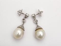 Exquisitos pendientes de perlas y diamantes