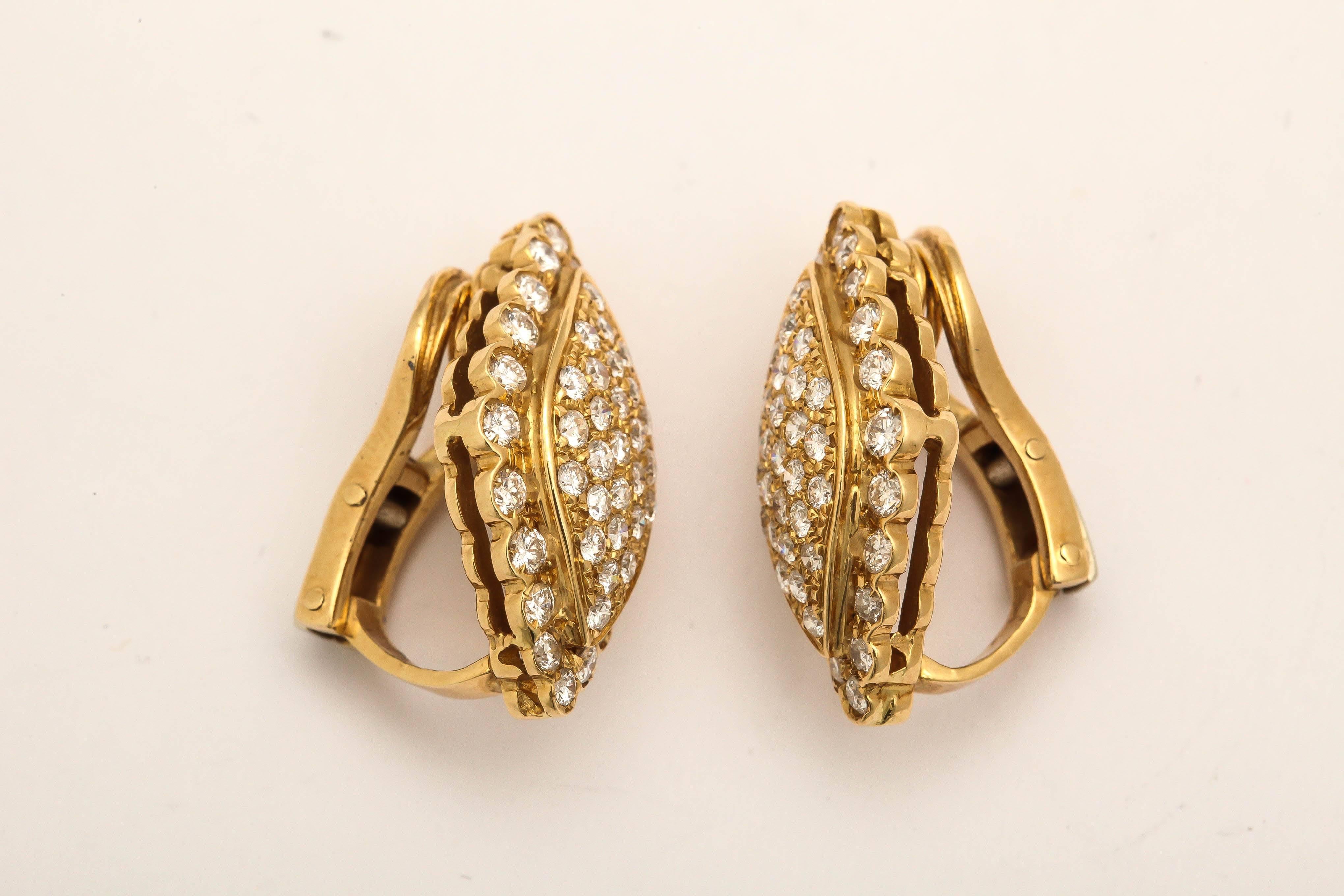 dramatic gold earrings