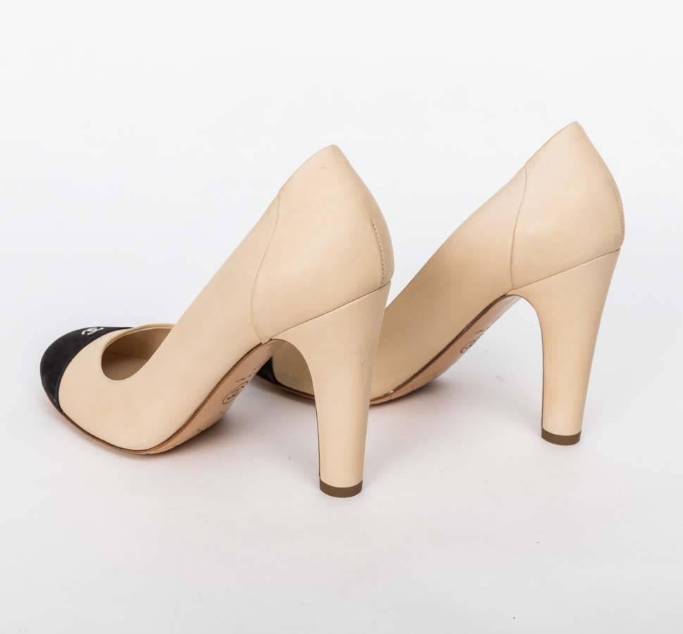 Chanel Beige & Black Lambskin CC Cap Toe Pump In Excellent Condition In Westhampton Beach, NY