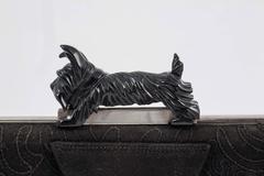 Black stitched suede and chrome clutch with bakelite 'Scottie Dog' clasp, 1930s