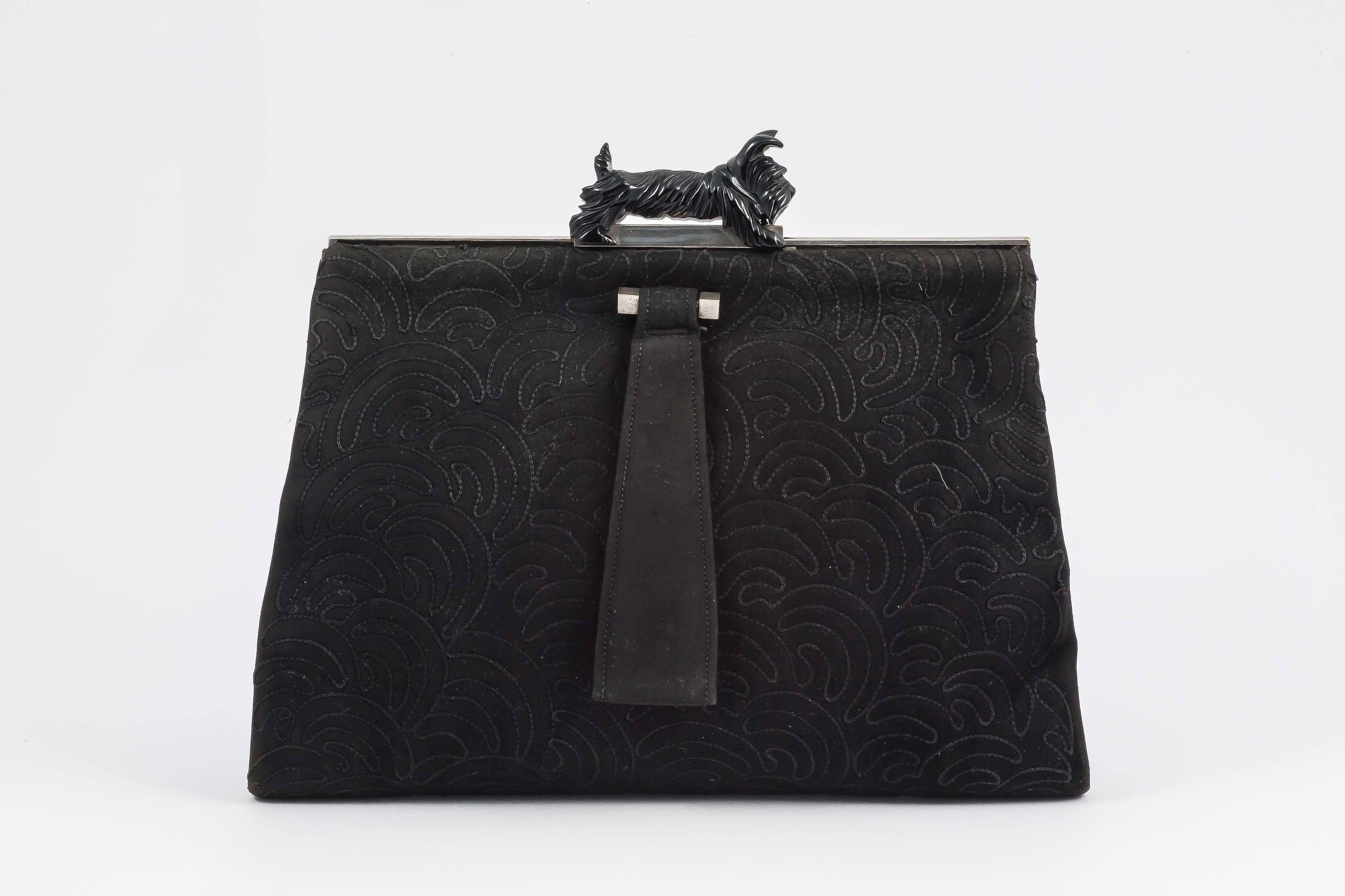 Women's Black stitched suede and chrome clutch with bakelite 'Scottie Dog' clasp, 1930s