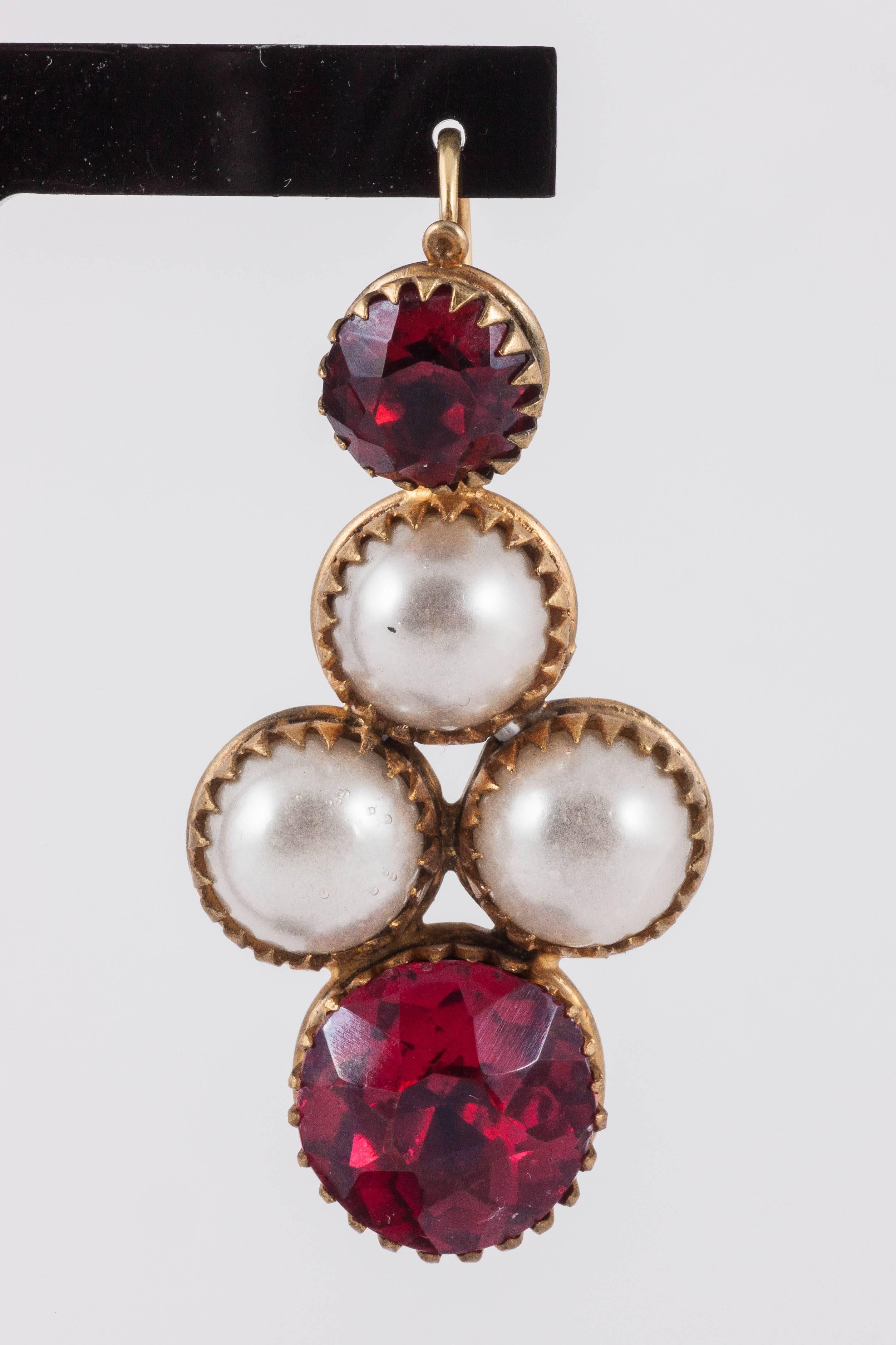 These earrings must have been the sort of things Chanel had in mind when she started to design pieces with Maison Gripoix. Possibly theatrical,these however are much much earlier than Chanel,probably around 1830. The construction is interesting, the