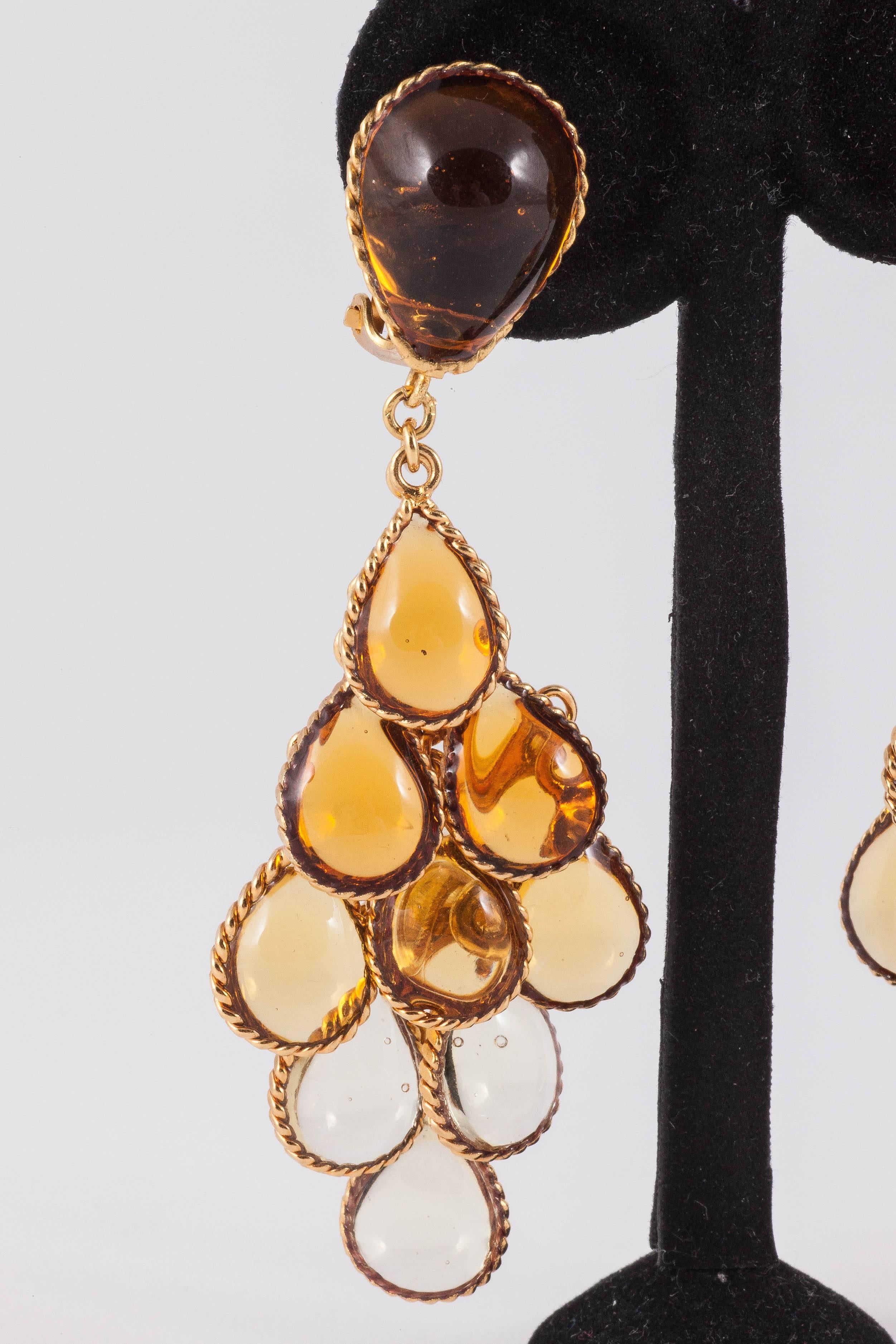 Chic and elegant articulated drop earrings in cascading hues of  transparent topaz to citrine, from the WW collection, a contemporary limited edition, hand made in Paris.
They have a clip fitting and each section is articulated, giving a beautiful