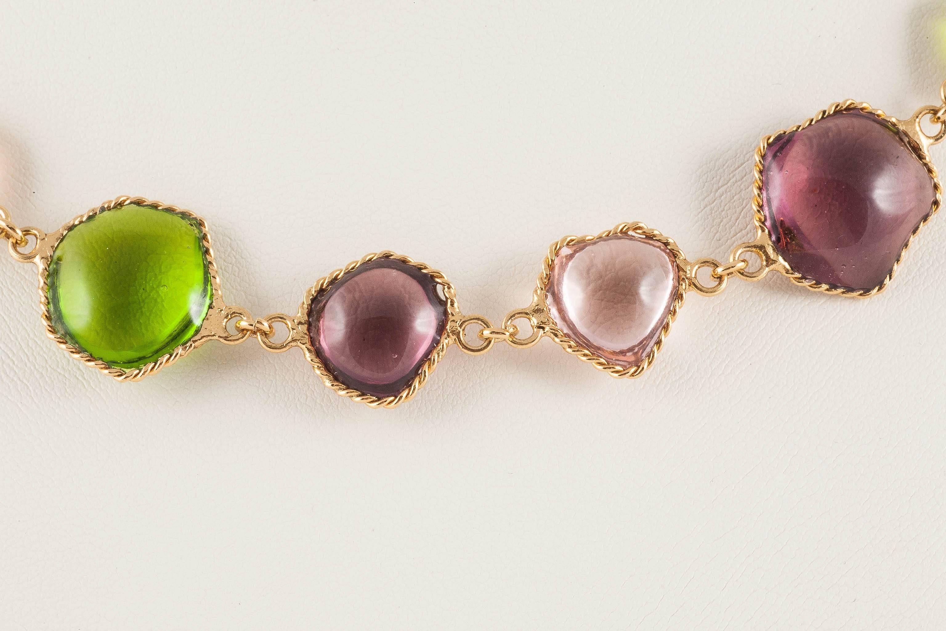 Light, Summery and fresh in colour and to wear, soft delicate hues of lilac, amethyst and peridot are joined in a simple row necklace,from the WW 'Harlequin' collection. Handmade from poured glass and gilded metal from the WW Collection - a