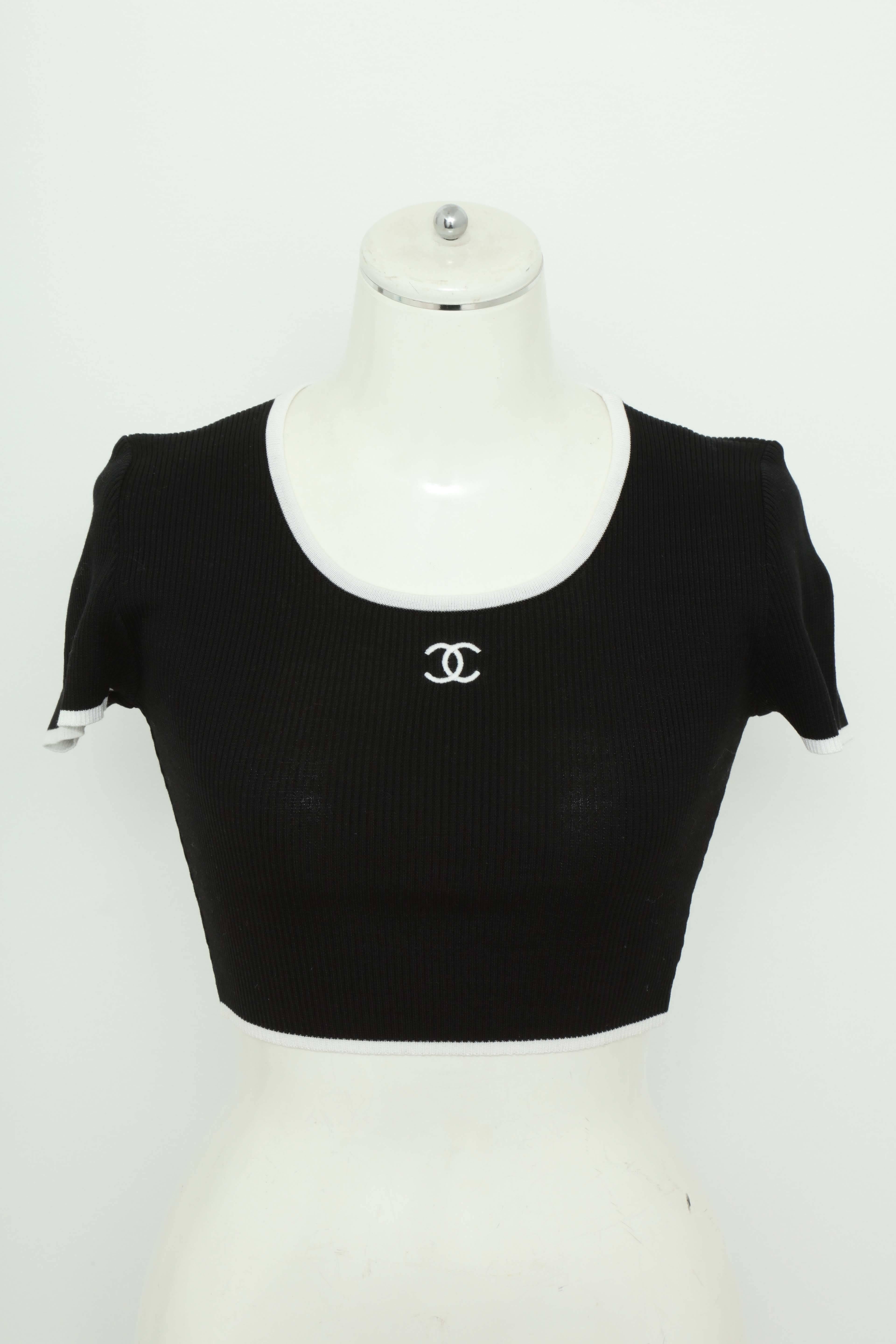Very rare vintage Chanel black cropped twin knit with iconic CC buttons. French size 38.
