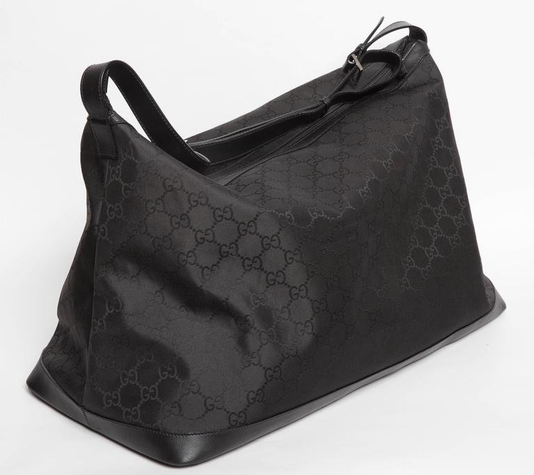 Gucci Nylon Duffel Bag with Black Leather Strap and Silver Hardware at