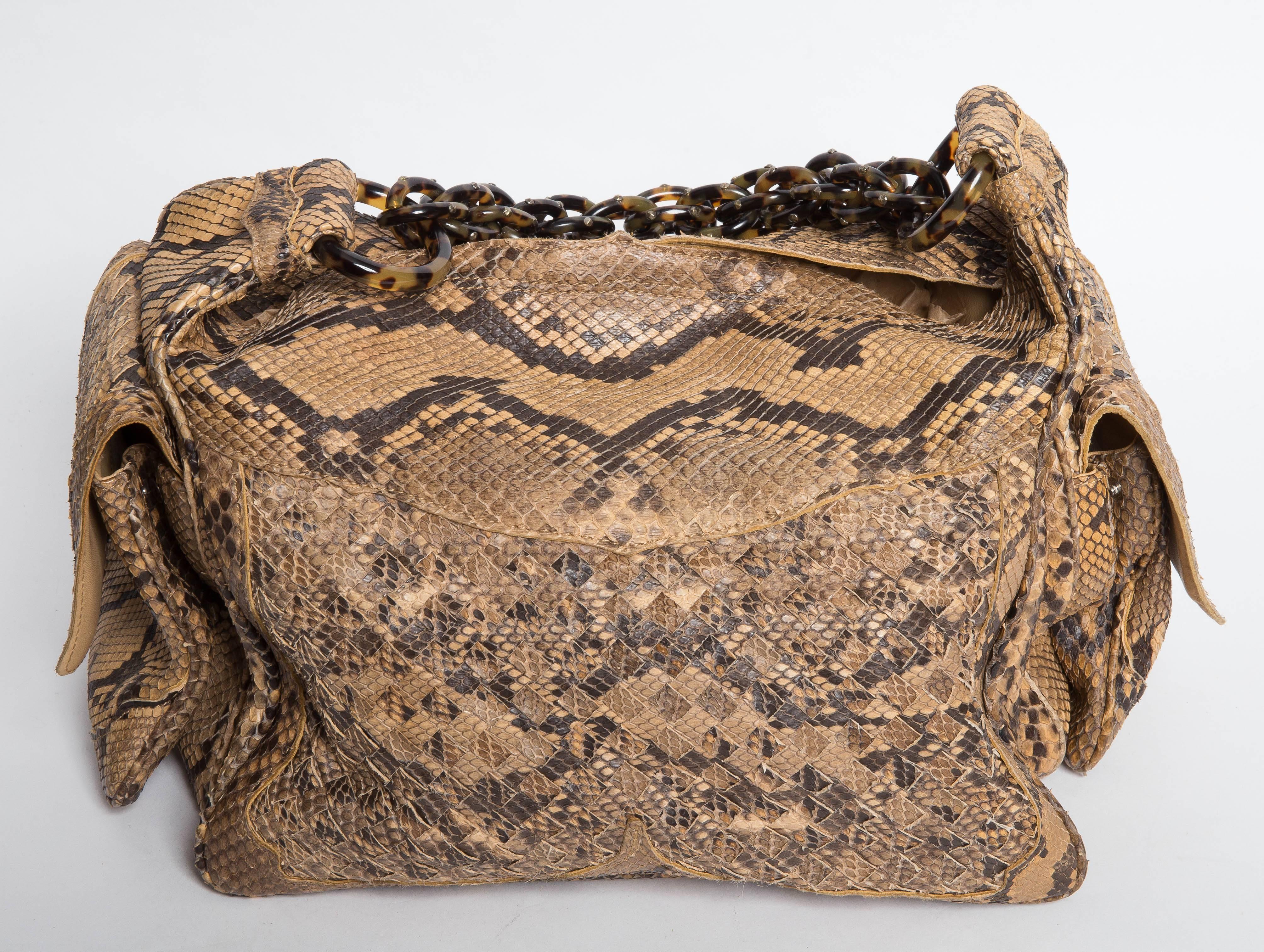 Stunning Bottega Veneta Ltd Edition Python Shoulder Bag with Studded Tortoise Shell Chain. Features 2 Side Pouches and an Interior Zipped Pocket. Lined in Suede, This Bag is Pure Luxe.
