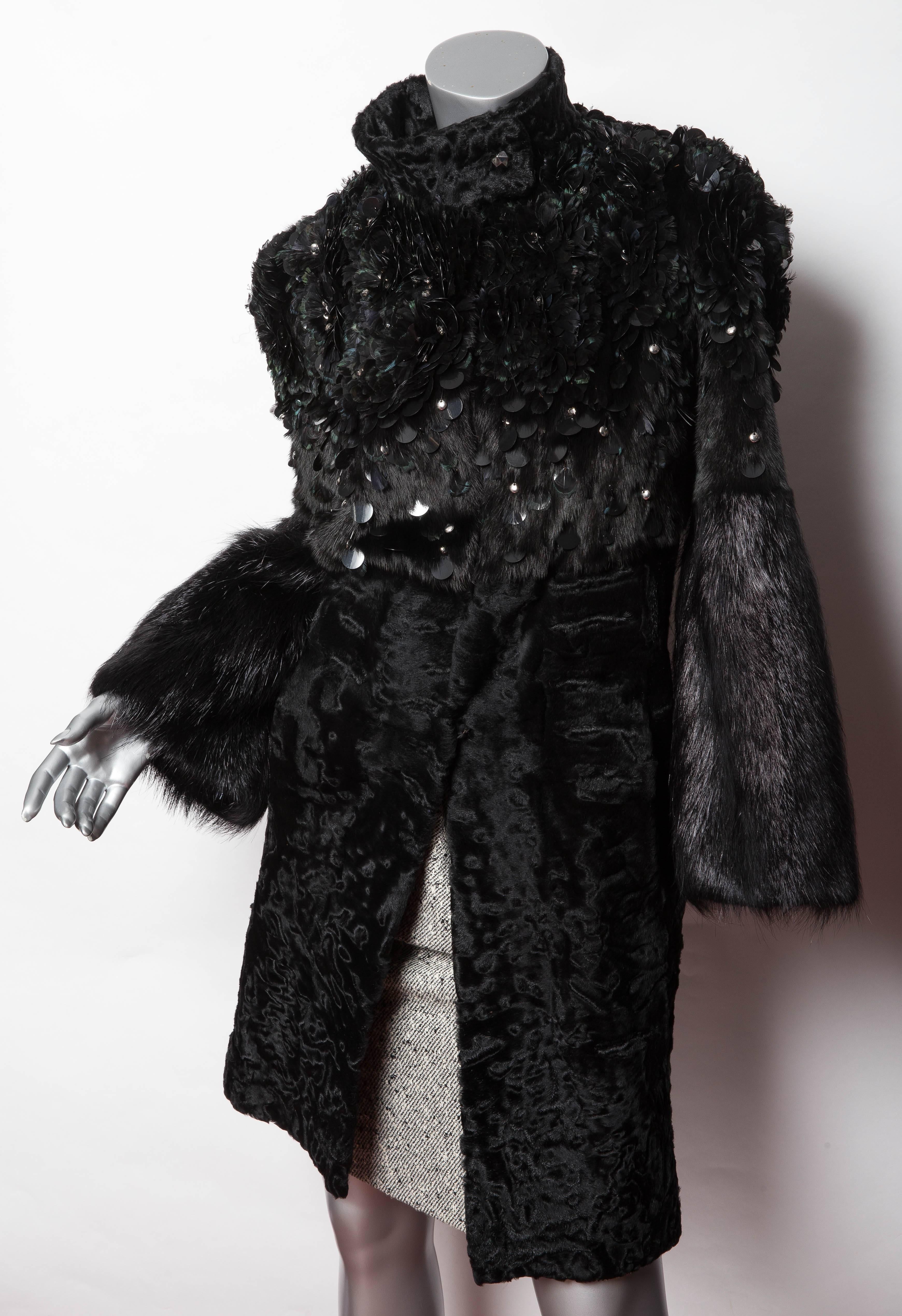 Gucci Runway Persian Lamb and Mink Coat. Gucci Persian Lamb and Mink Coat embellished with Peacock Feathers, Paillettes and Crystals. The top 1/3rd of the coat features mink and graduates to lamb just under the bust. The sleeves feature long hair