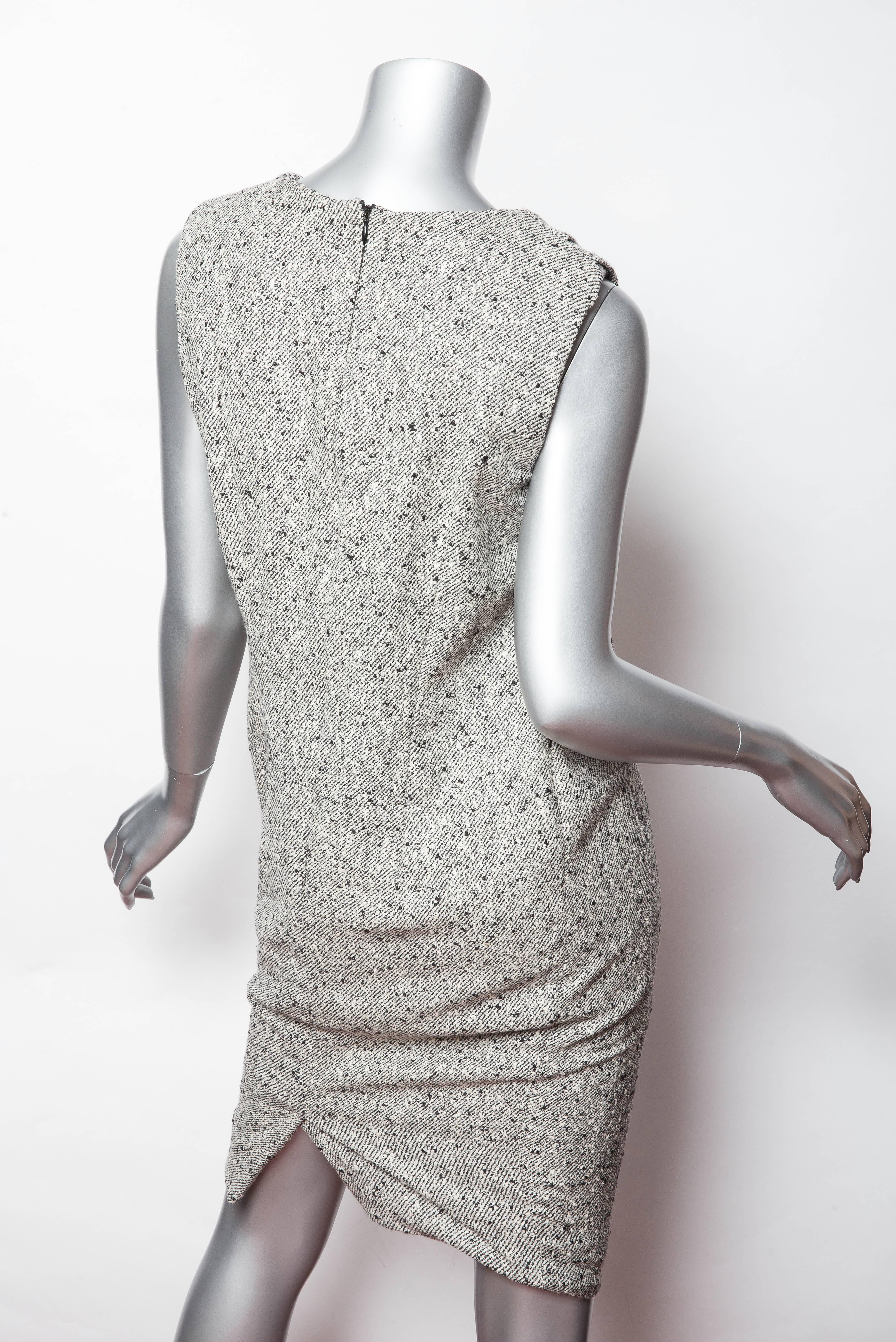 Very chic Carolina Herrera Sleeveless Wool Dress in Black and Cream Boucle with a back zip. 