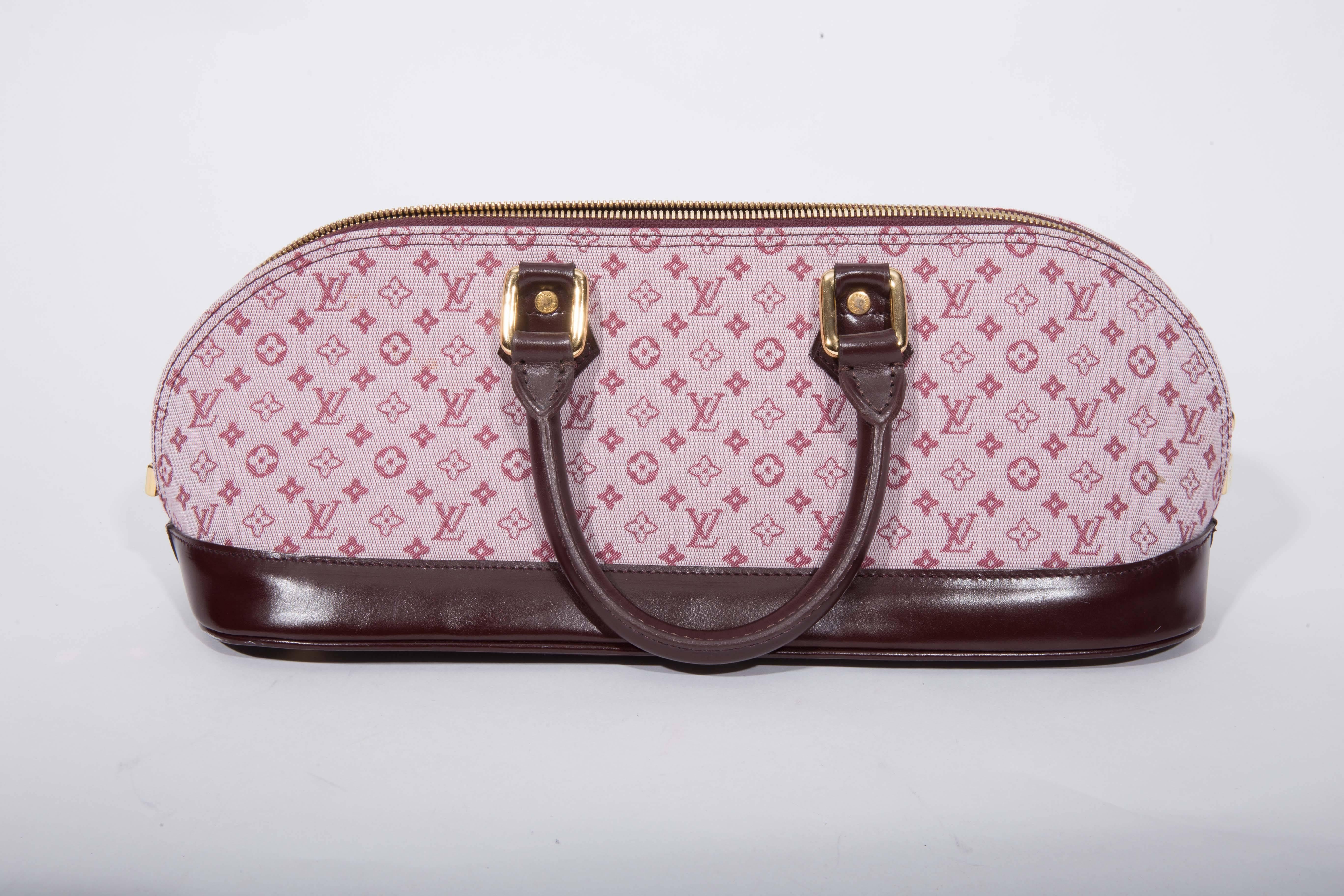 Louis Vuitton Mini Lin Long Top Handle Handbag In Excellent Condition In Westhampton Beach, NY