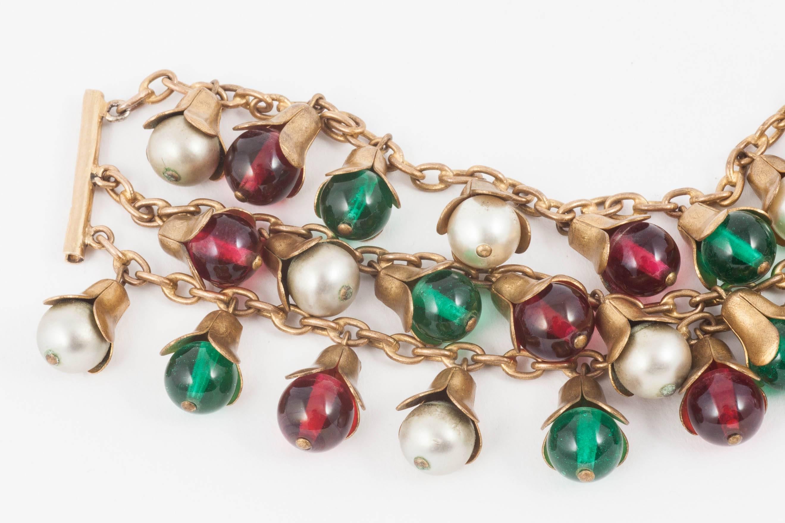 Lovely French glass and brass charm bracelet , 1930s In Good Condition In Greyabbey, County Down