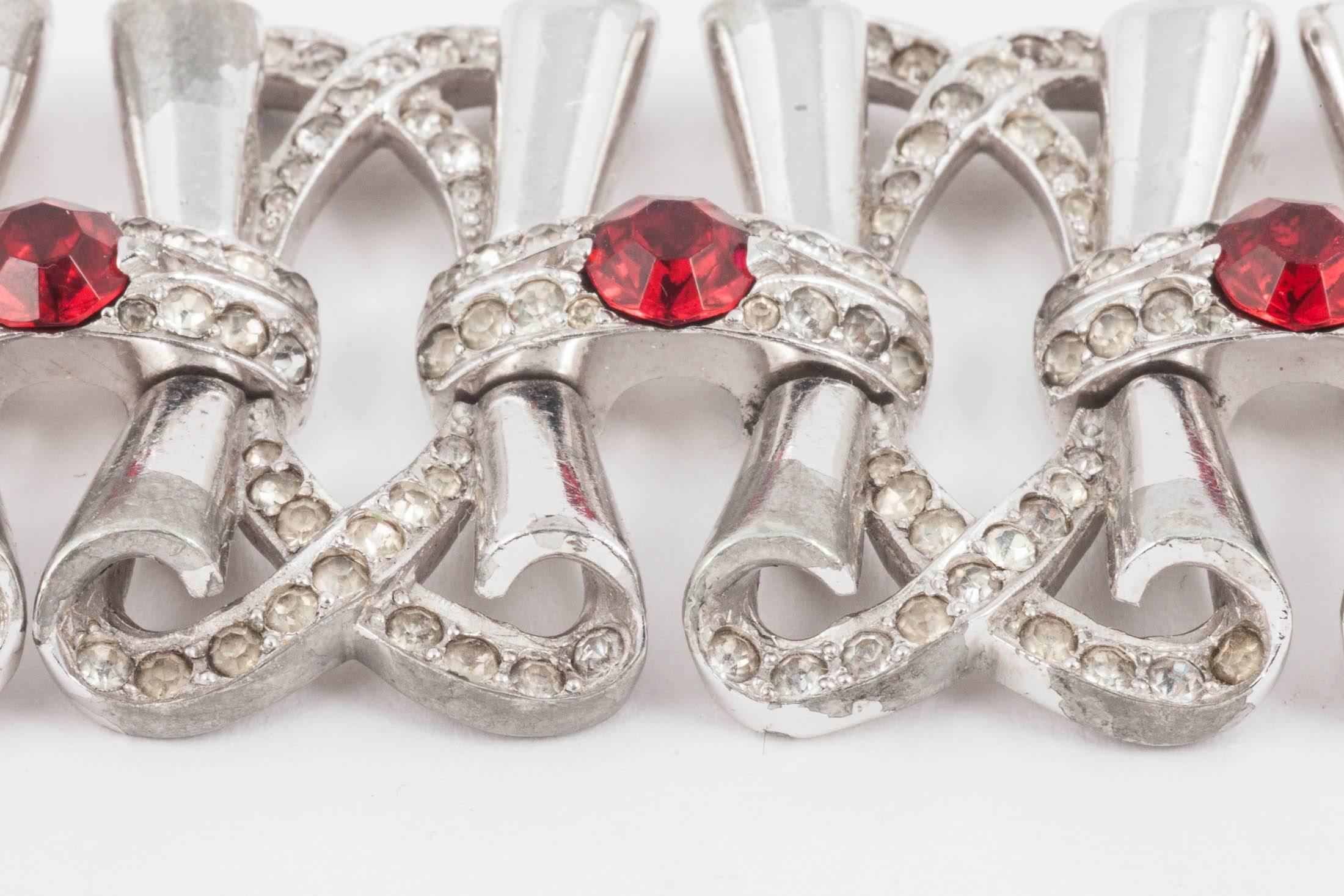 Women's Fluid rhodium plated cocktail bracelet with clear and red paste accents, 1950s