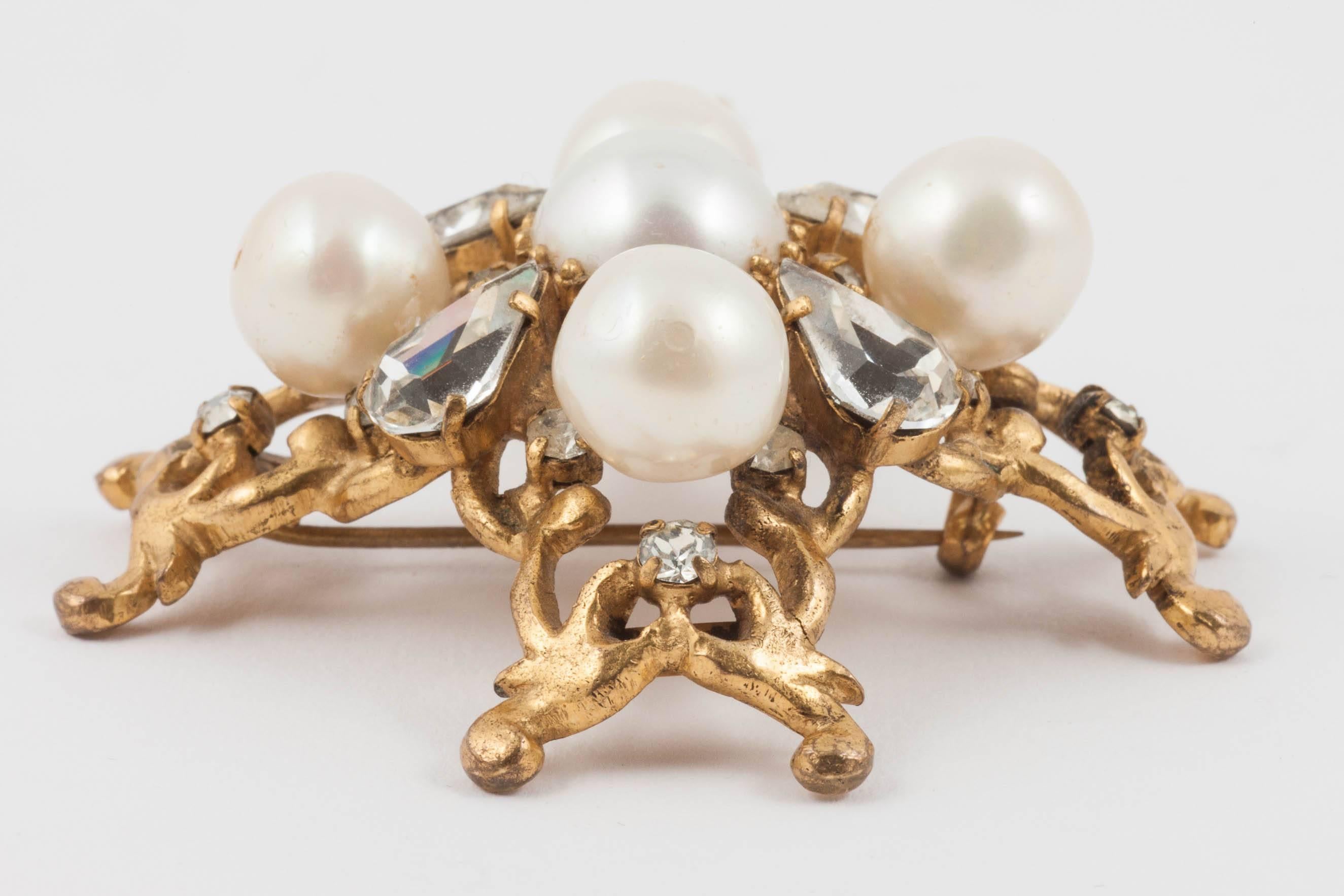 A very rare and early Chanel brooch, made for Chanel when the atelier was still 'young' with a team of no more than 7 or 8 jewellers, producing exquisite handmade pieces , designed by Chanel herself. Hand cut and set with baroque pearls and pastes,