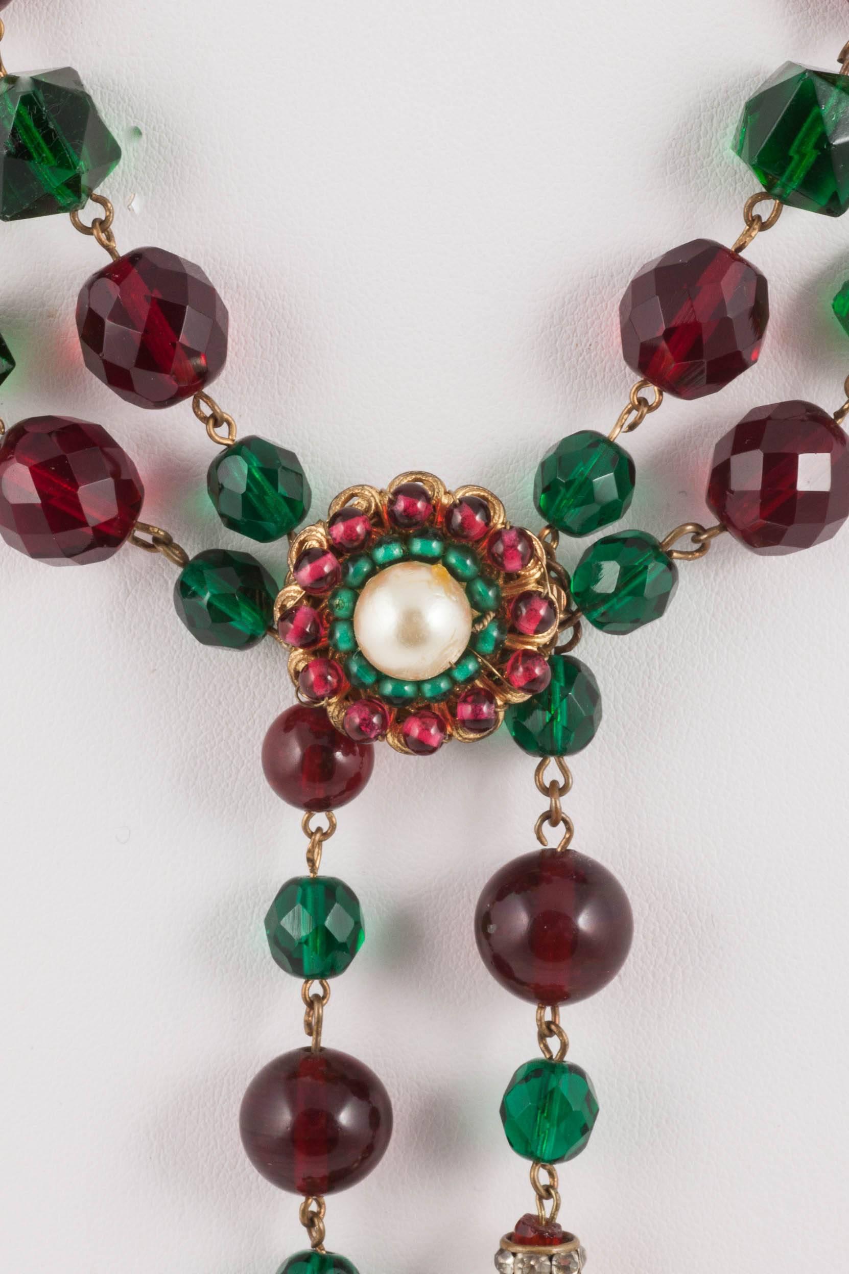 Wonderful, stylish and beautifully made double tassle/sautoir necklace in both round and faceted beads, pearls and paste rondelles. Highly typical of the Chanel style by Maison Gripoix from the 1930s, very wearable and highly collectable, in a