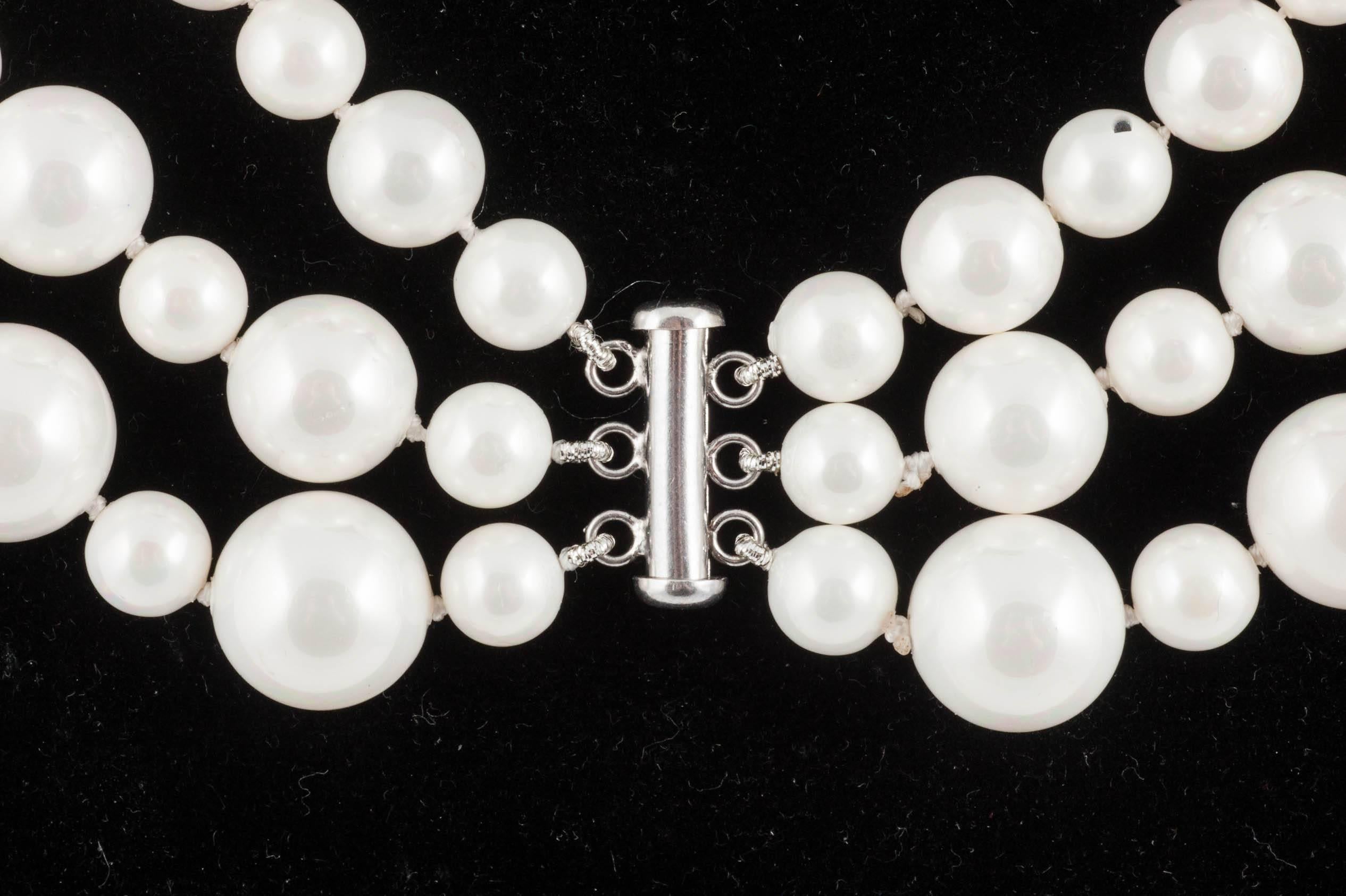 Women's Classic 3 row pearl necklace, with matching drop earrings, 1990s