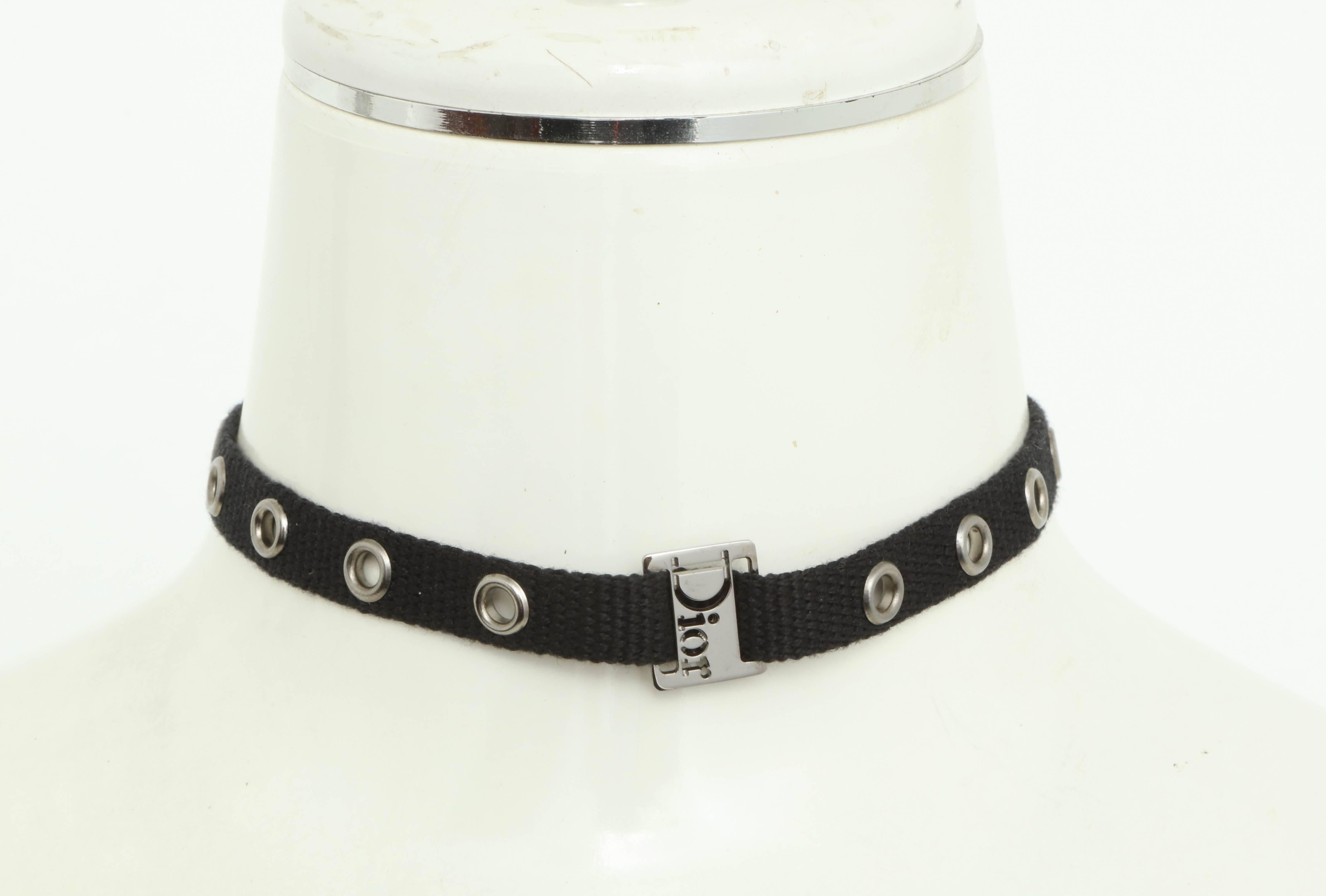 Beautiful Dior by John Galliano black choker with silver hardware.

Length: Adjustable 12 to 14 inches