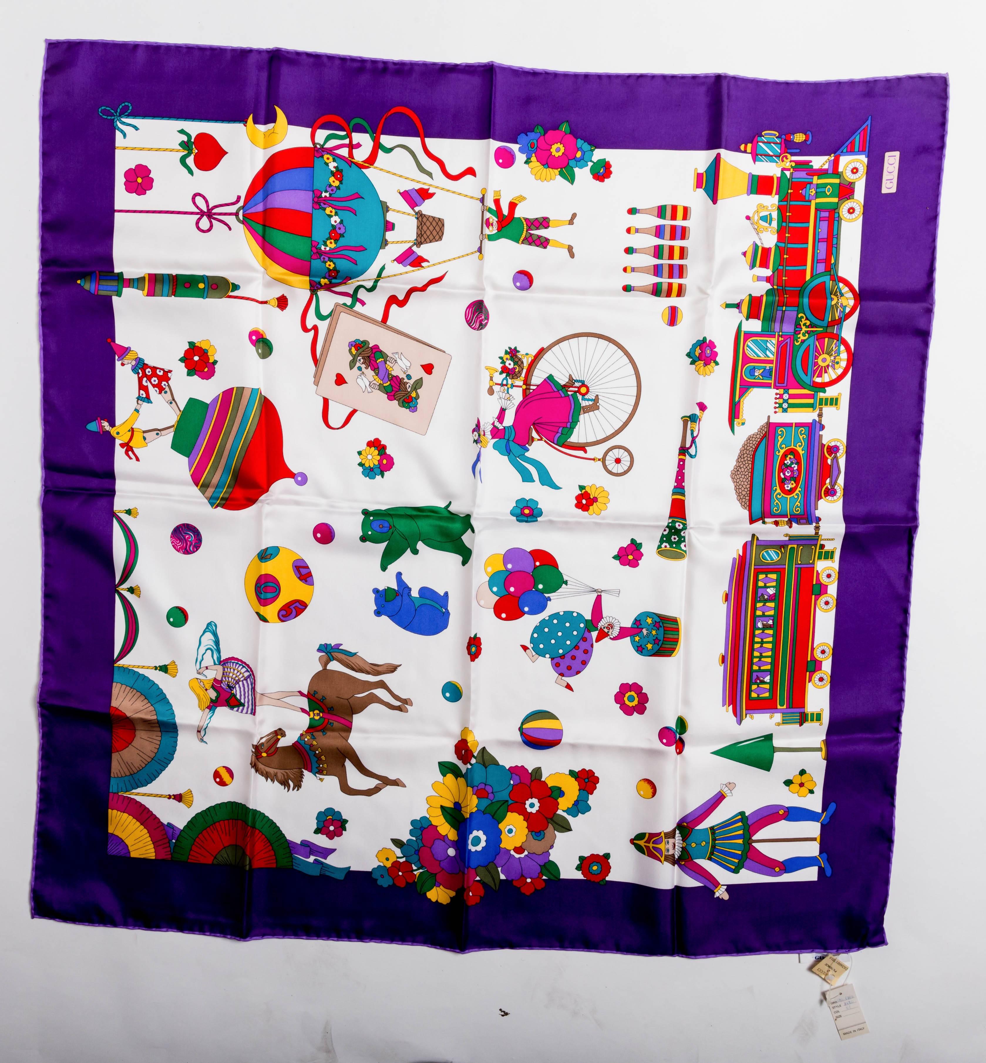 This vintage Gucci scarf has never been used and its original Gucci tags are still attached. Part of Gucci's circus collection, this silk scarf features a purple border and whimsical bears, clowns, horses and flowers throughout. Vibrant colors make