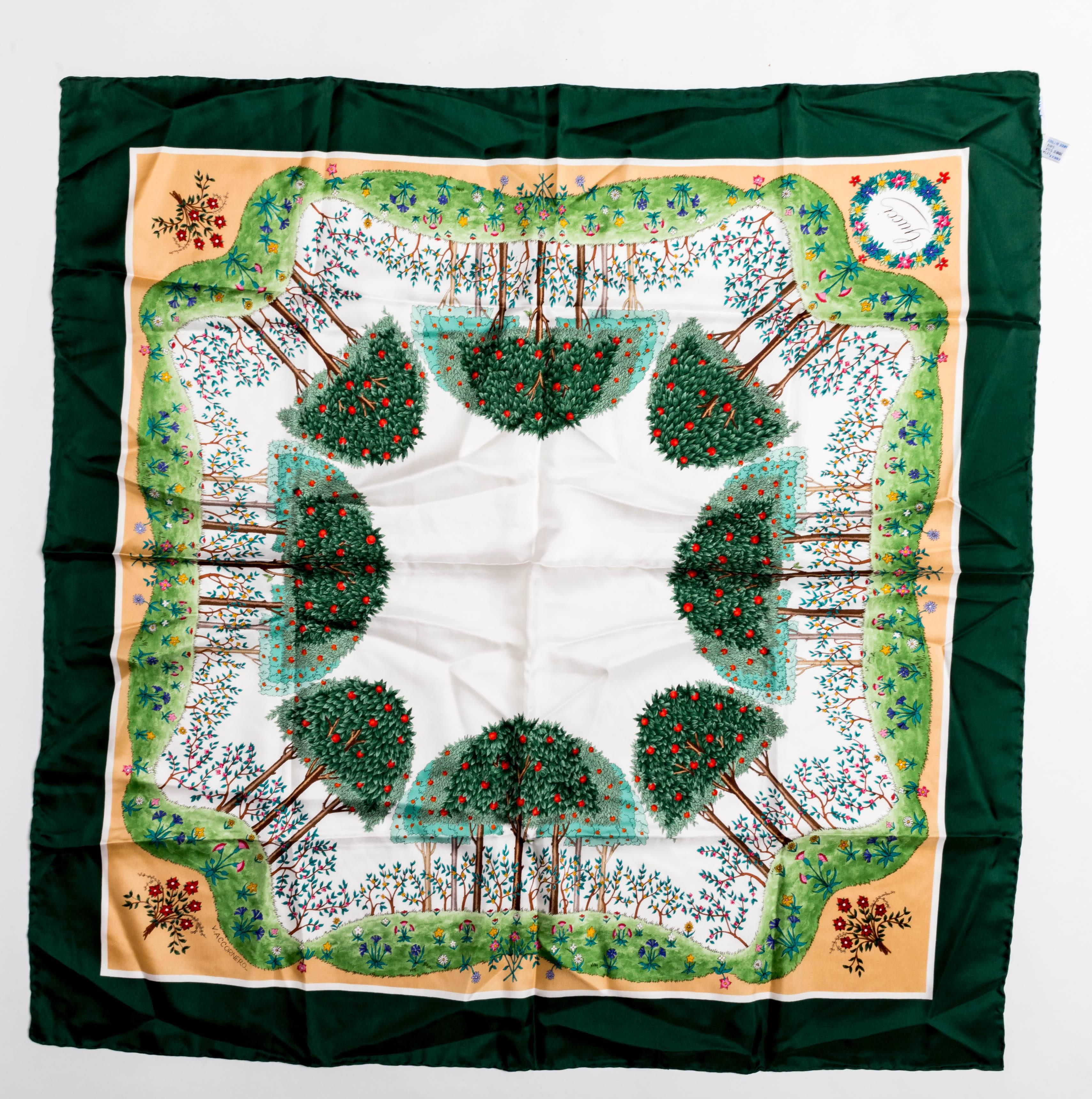 Vintage Gucci Silk Scarf with Green Border featuring apple trees surrounded by a floral garland. Condition is excellent.