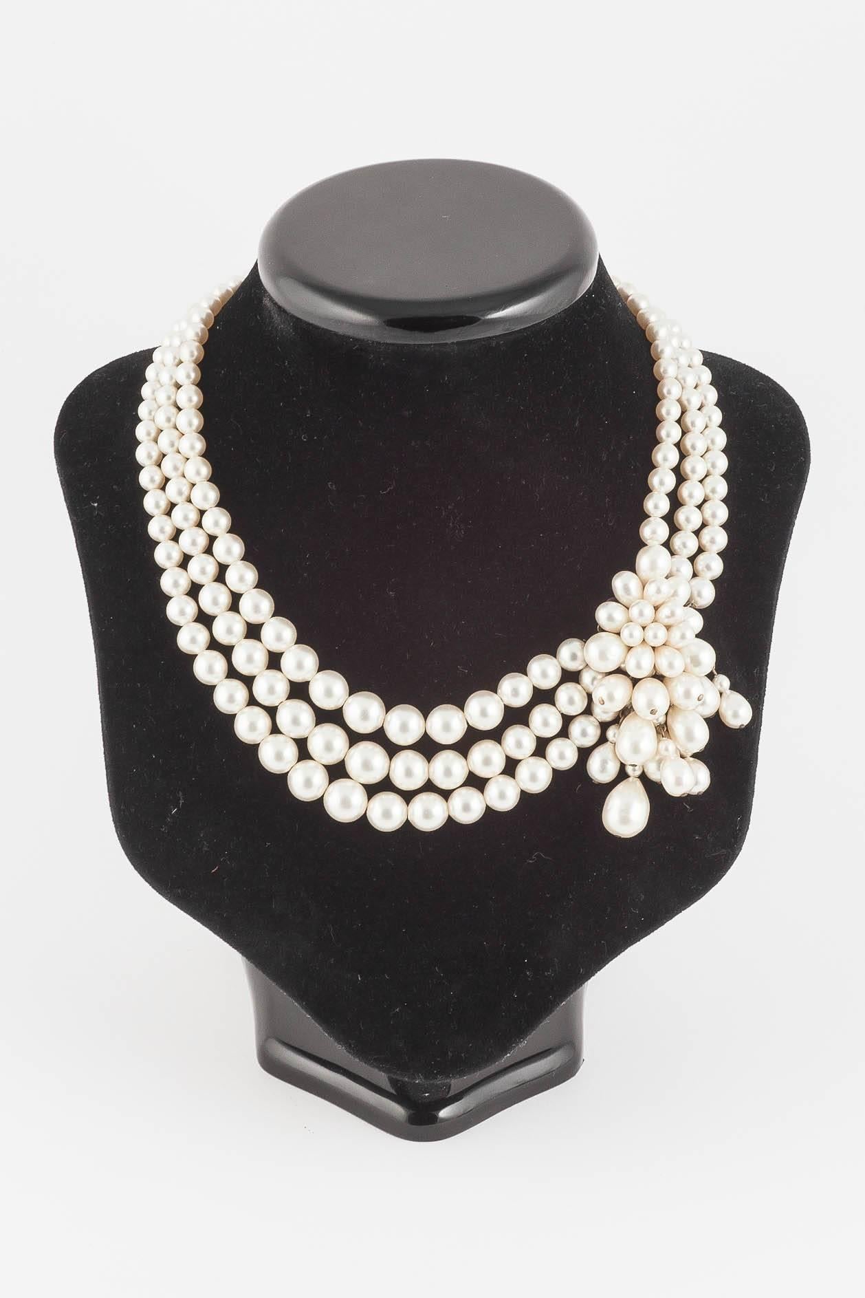 Sumptuous necklace and matching earrings of baroque pearls, with a cascading side or centrepiece to highlight the necklace from Louis Rousselet, made in the mid 1950s in Paris. The matching earrings are very wearable by themselves, with five