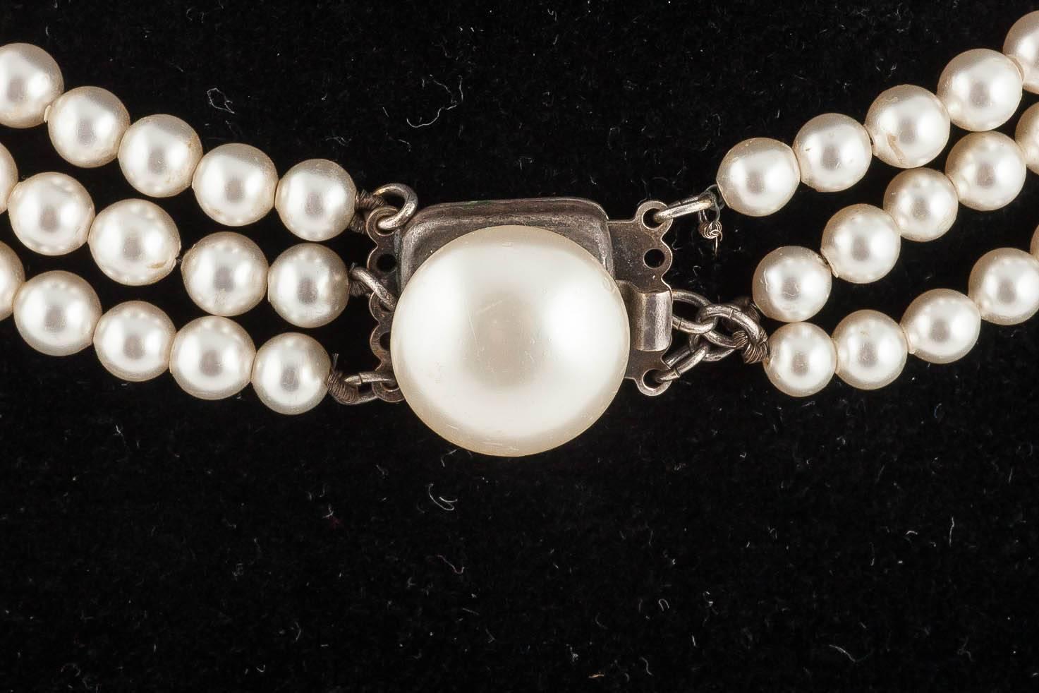Women's Louis Rousselet three row baroque pearl necklace with matching earrings, 1950s