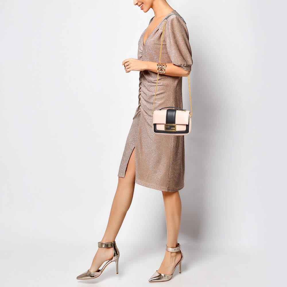 Functional and stylish this designer labels collections capture the effortless elegant finesse of the modern woman. Crafted from quality materials this chic bag is easy to carry and can fit in your daily essentials effortlessly.
