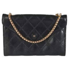 Chanel Vintage Negro Acolchado Piel de Cordero Mini CC Clutch