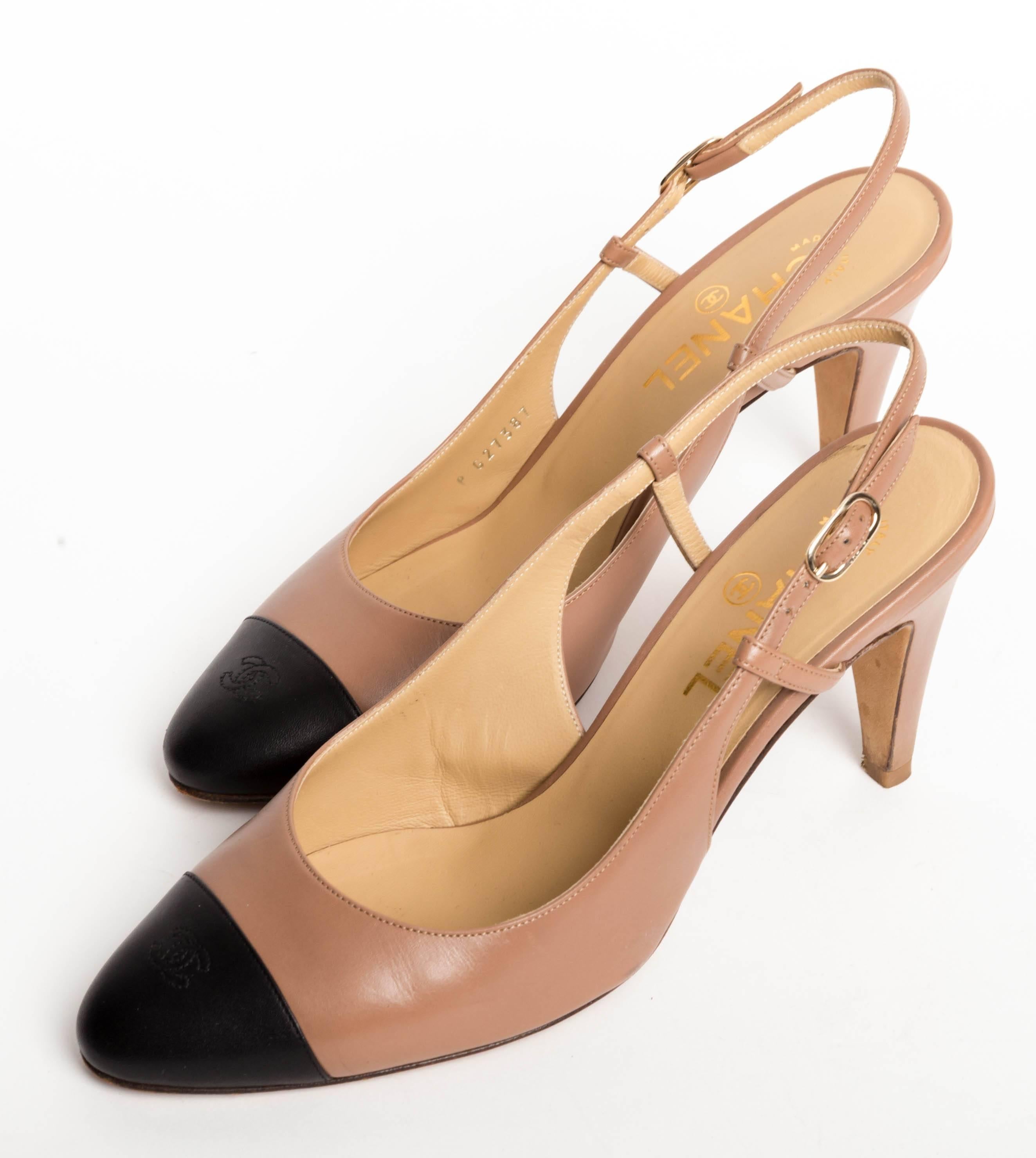 Chanel Brown and Black Slingback Pumps
Wear to Soles Otherwise Excellent Condition