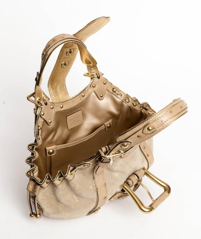Sold at Auction: Louis Vuitton Limited Edition Gold Ostrich and Suede Theda  GM Bag