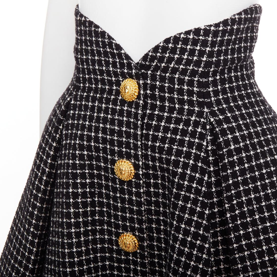 BALMAIN Tulip nero bianco pied de poule in cotone tweed gonna svasata FR34 XS
Riferimento: AAWC/A01457
Marchio: Balmain
Designer: Olivier Rousteing
Model: Tulipano
Materiale: Tweed
Colore: Nero, Bianco
Modello: Pied de poule
Chiusura: zip
Fodera: