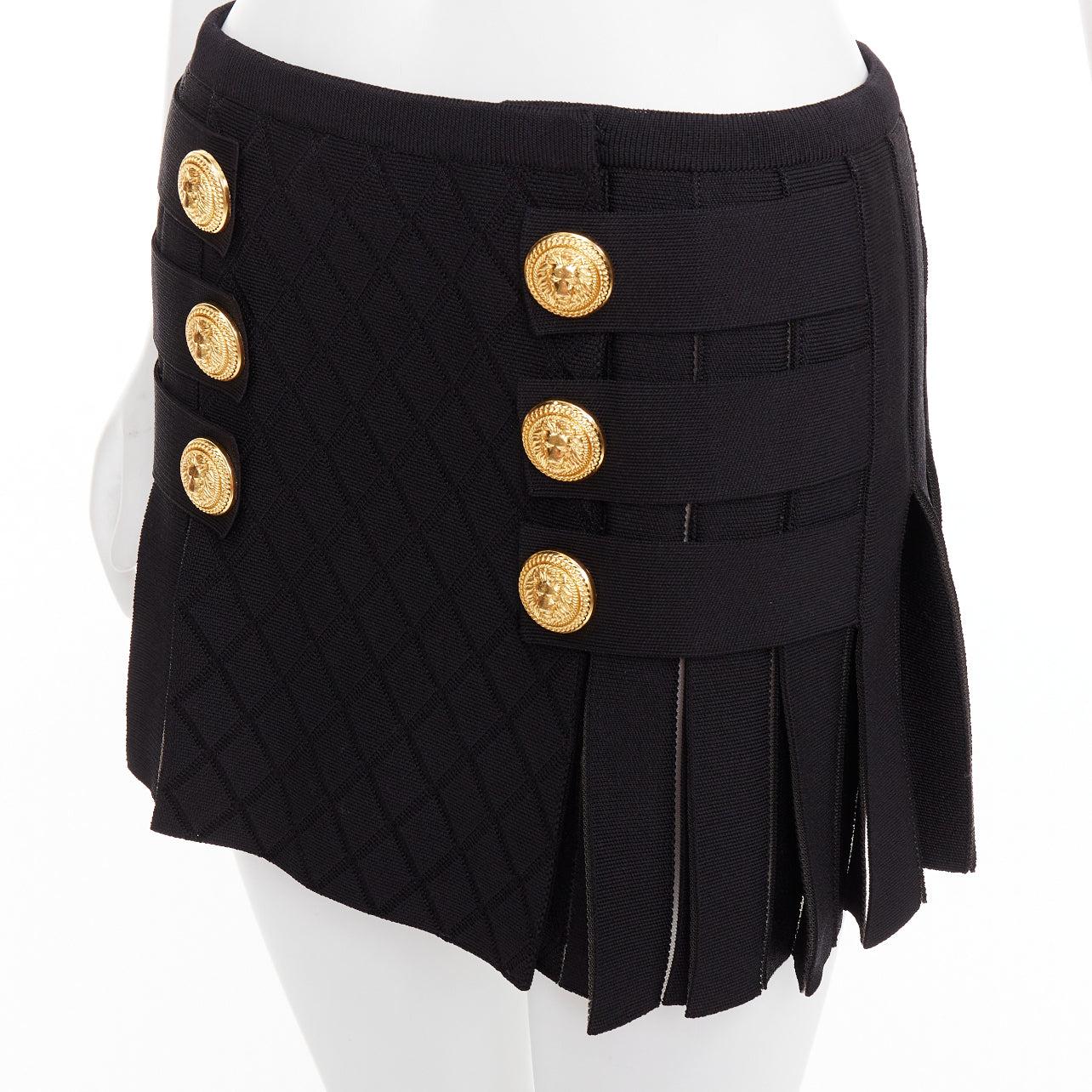 Mini jupe plissée en maille quadrillée à boutons de lion dorés noirs BALMAIN FR34 XS en vente 2