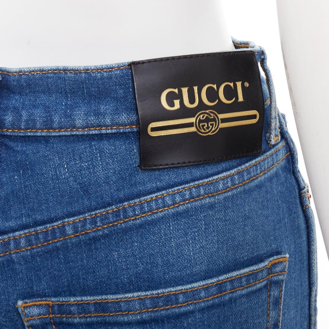 GUCCI Alessandro Michele 2021 logo rouge jean évasé en denim bleu 25