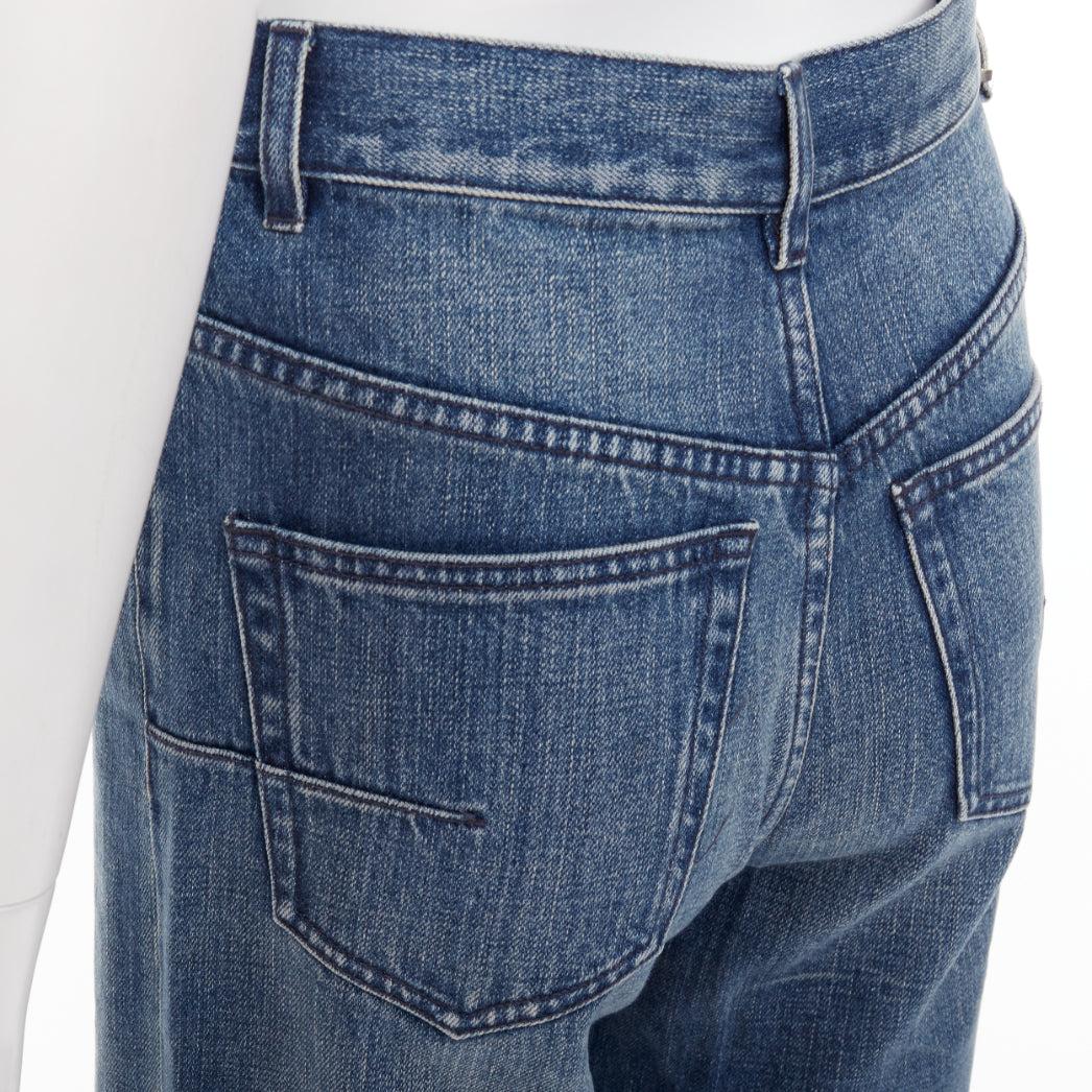 CHRISTIAN DIOR jean large cropped bleu foncé délavé à poches arrondies FR36 S
Référence : NKLL/A00553
Marque : Dior
Créatrice : Maria Grazia Chiuri
MATERIAL : Denim
Couleur : Bleu
Motif : Solide
Fermeture : braguette à glissière
Détails