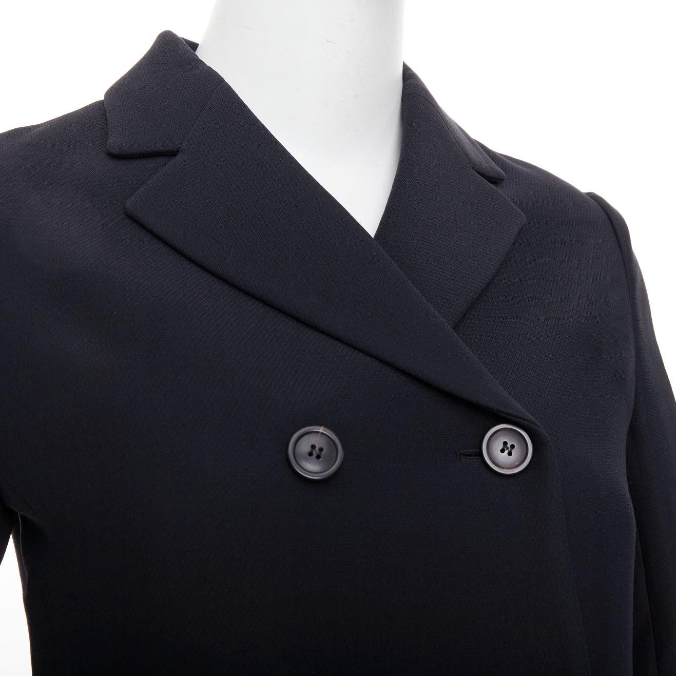 DIOR Marlene  blazer classico doppiopetto in lana e seta nera FR36 S
Riferimento: TGAS/F00111
Marchio: Dior
Stilista: MARIA GRAZIA CHIURI
Model: Bar
Materiale: Lana, seta
Colore: nero
Modello: Tinta unita
Chiusura: bottone
Fodera: Seta nera
Dettagli