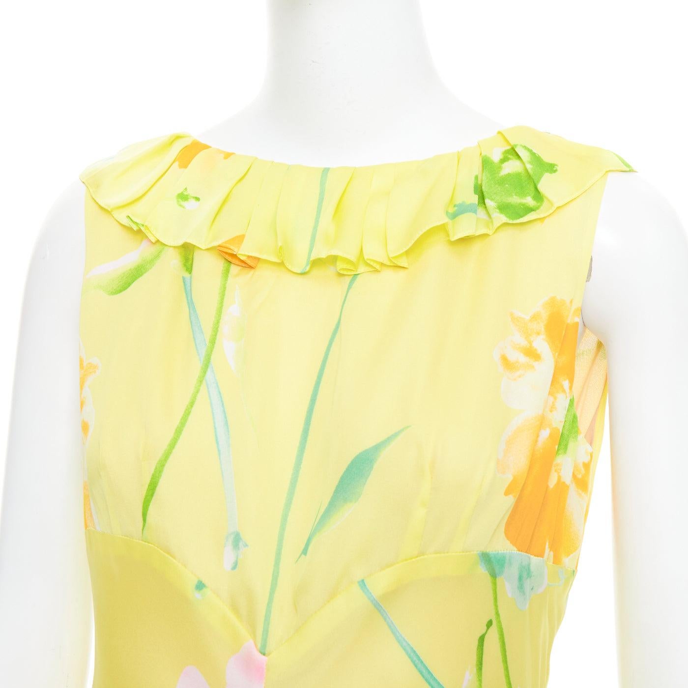 DONNA KARAN Robe longue vintage jaune à imprimé floral et col volanté
Référence : TGAS/E00468
Marque : Donna Karan
Collectional : Signature
Matériau : Tissu
Couleur : Jaune, Multicolore
Motif : Floral
Fermeture : Zip
Doublure : Tissu nude

CONDITION