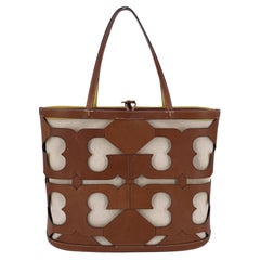 Bolso Tote Ella de lona y piel con logotipo recortado marrón de Tory Burch