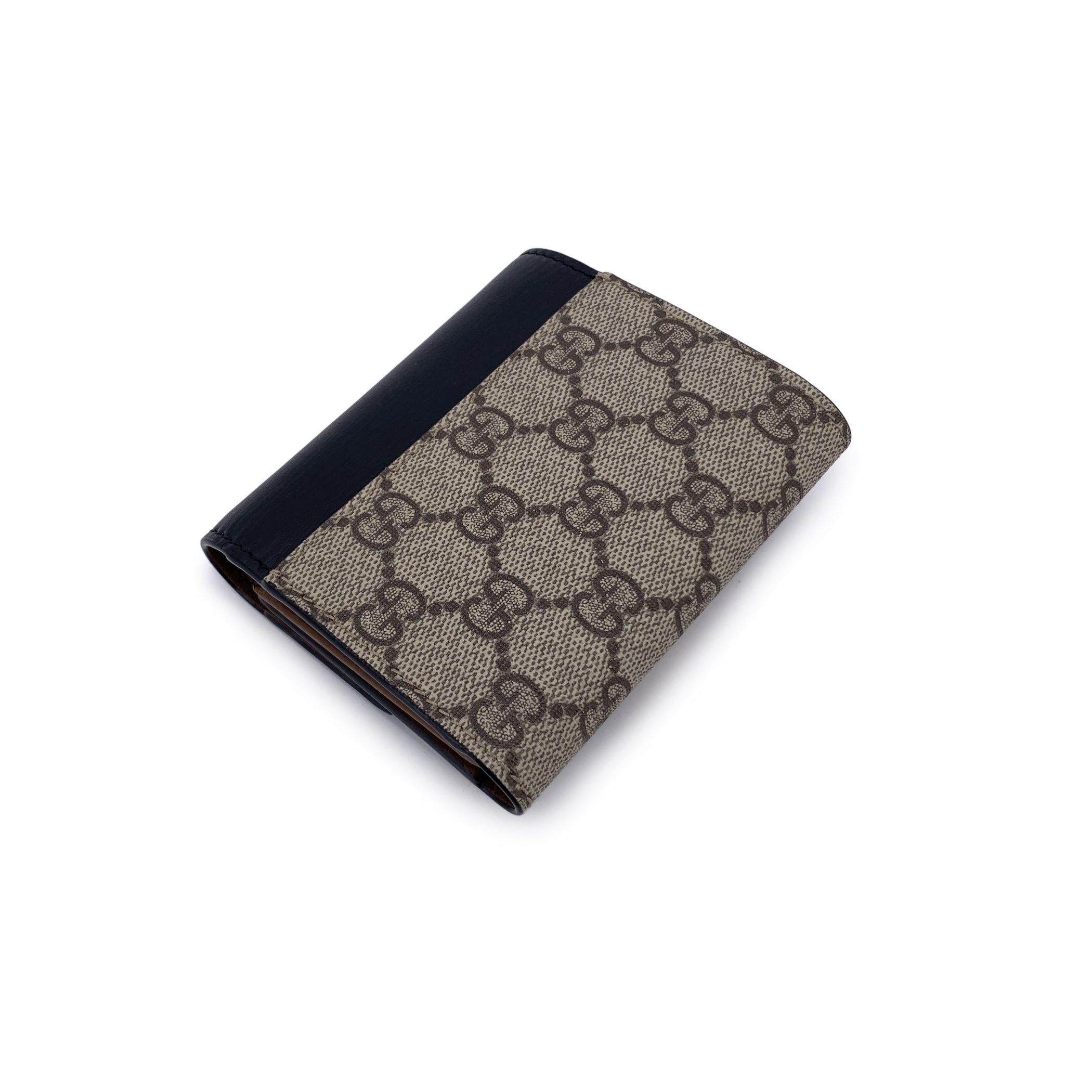 Noir Portefeuille à cadenas en toile et cuir avec monogramme GG de Gucci