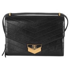 Chanel Black Chevron Quilted Calfskin Medal Flap Bag