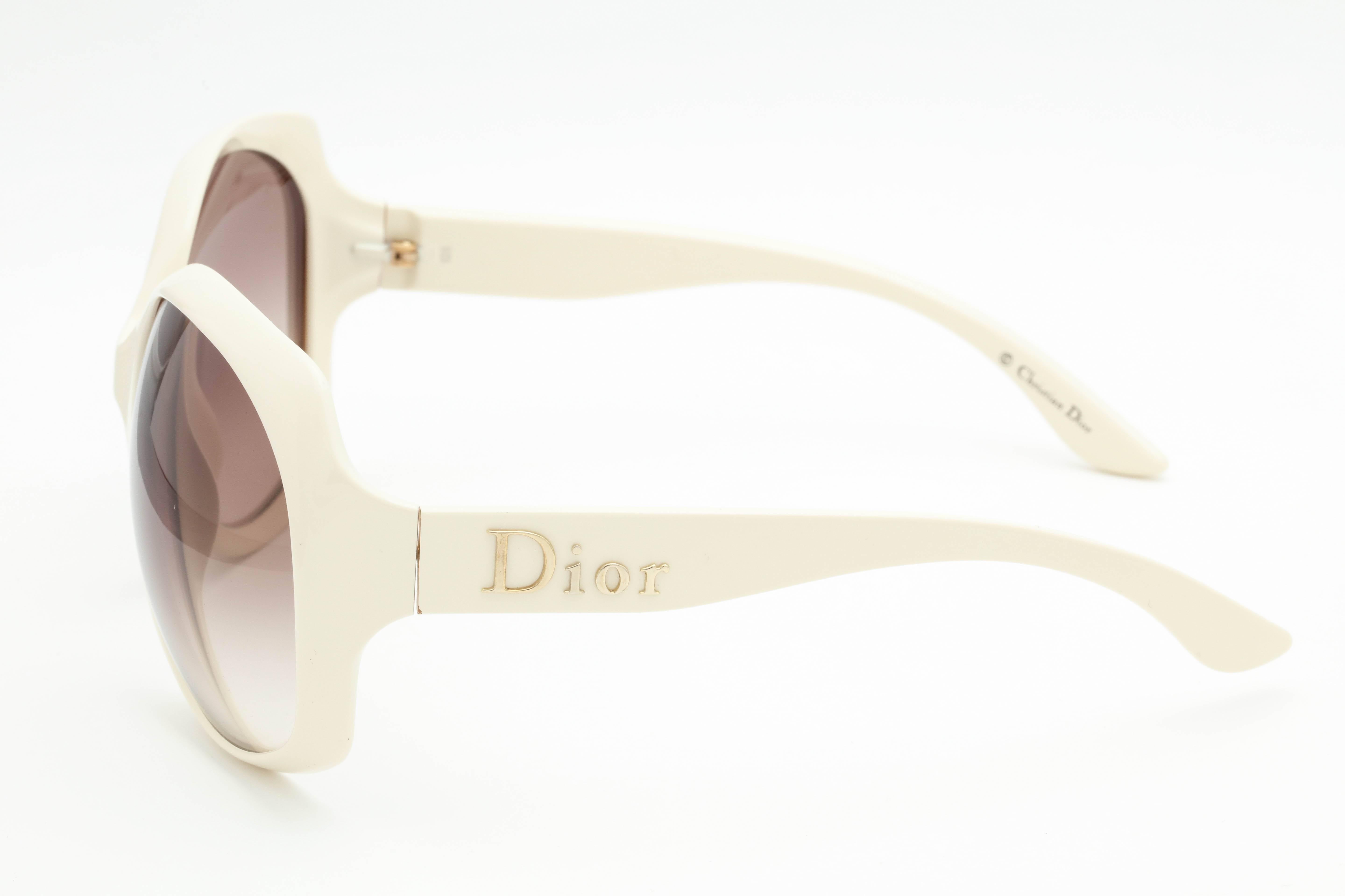 Chic Ivory colored Dior sunglasses 

Frame Width: 162mm 
Lens Width: 68mm 
Frame Height: 71mm 
Arm Length: 110mm